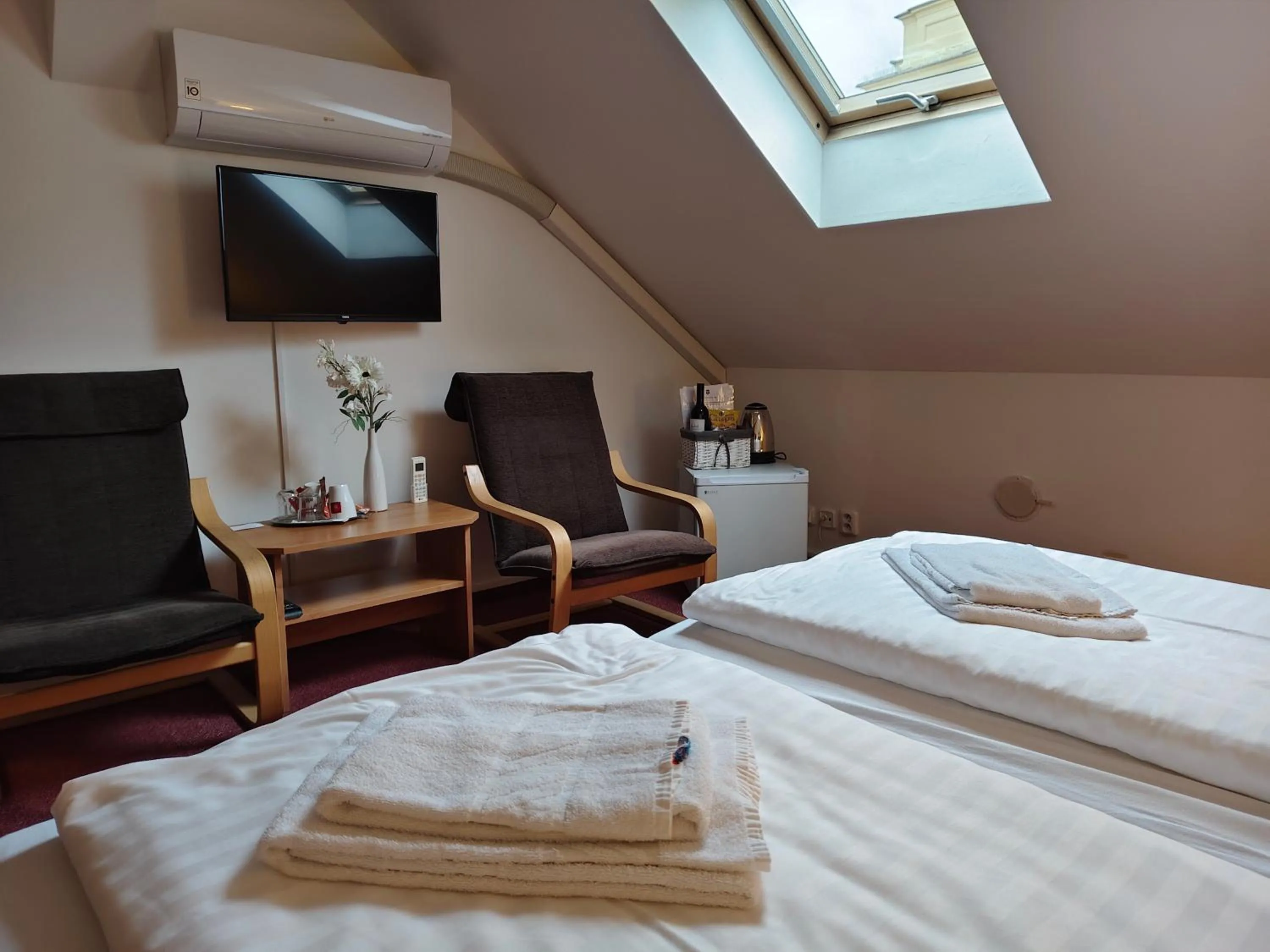 Bed in Hotel Bílý Koníček