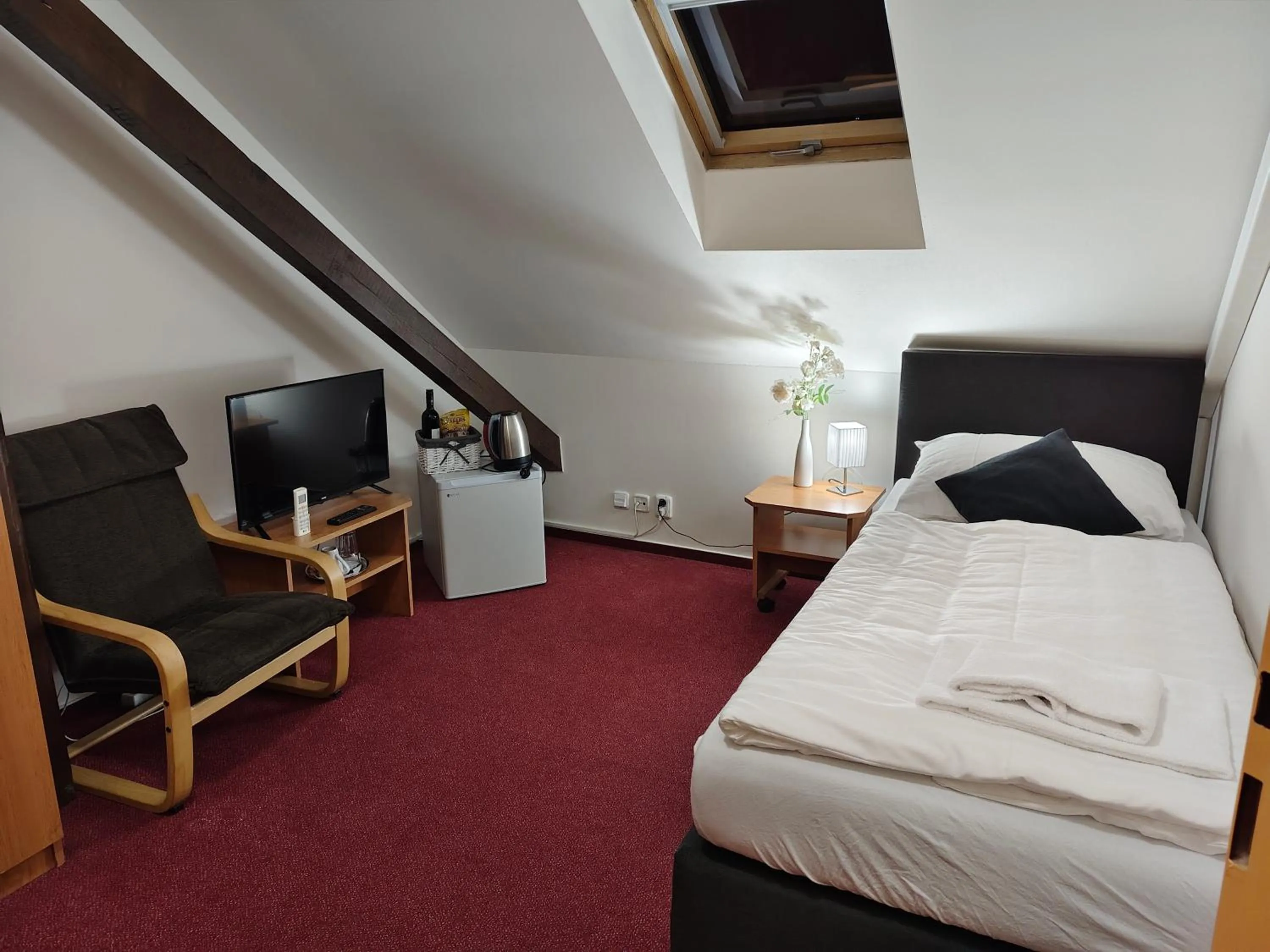 Bed in Hotel Bílý Koníček