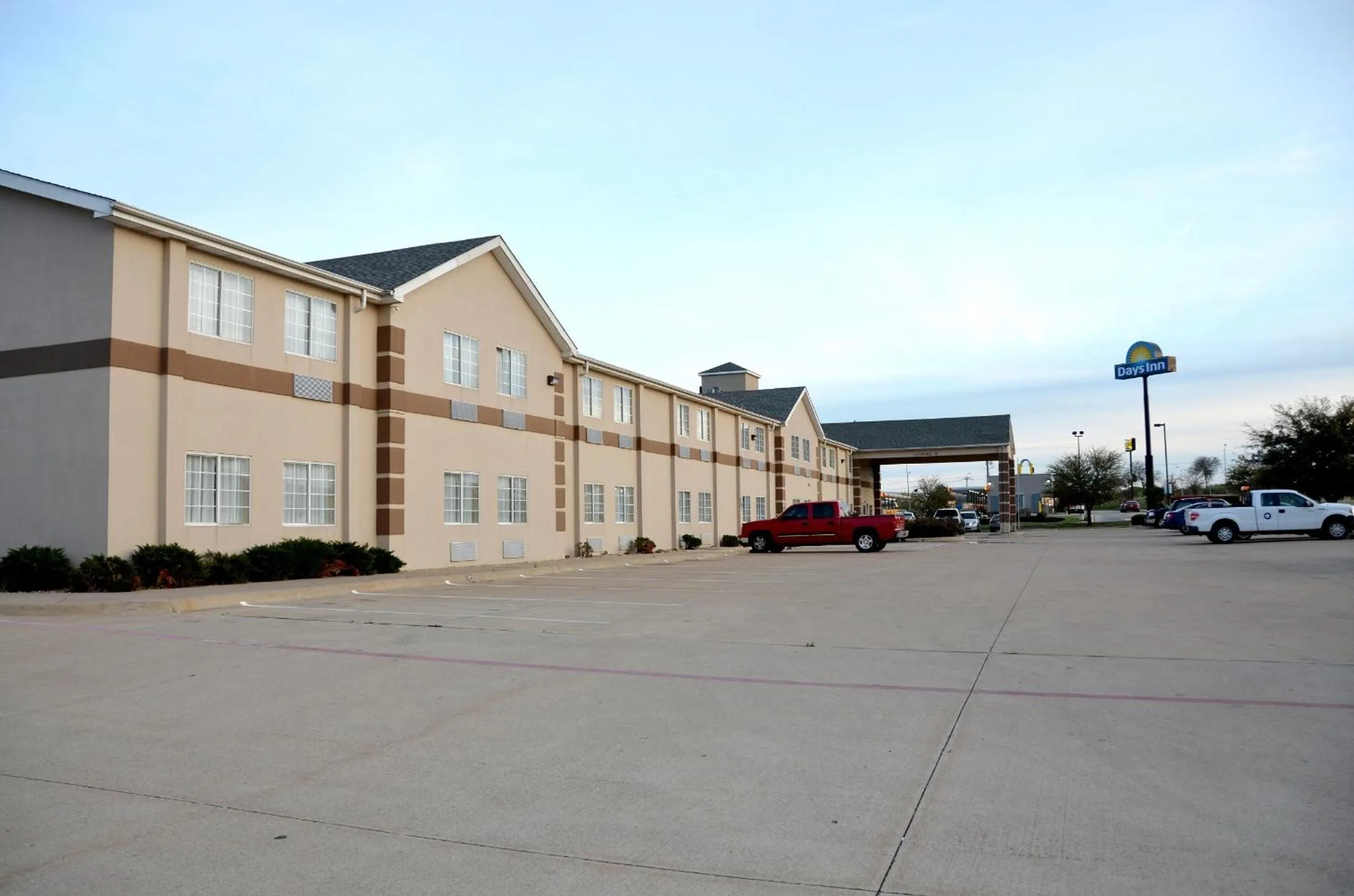 Property building in Days Inn by Wyndham Mesquite Rodeo TX
