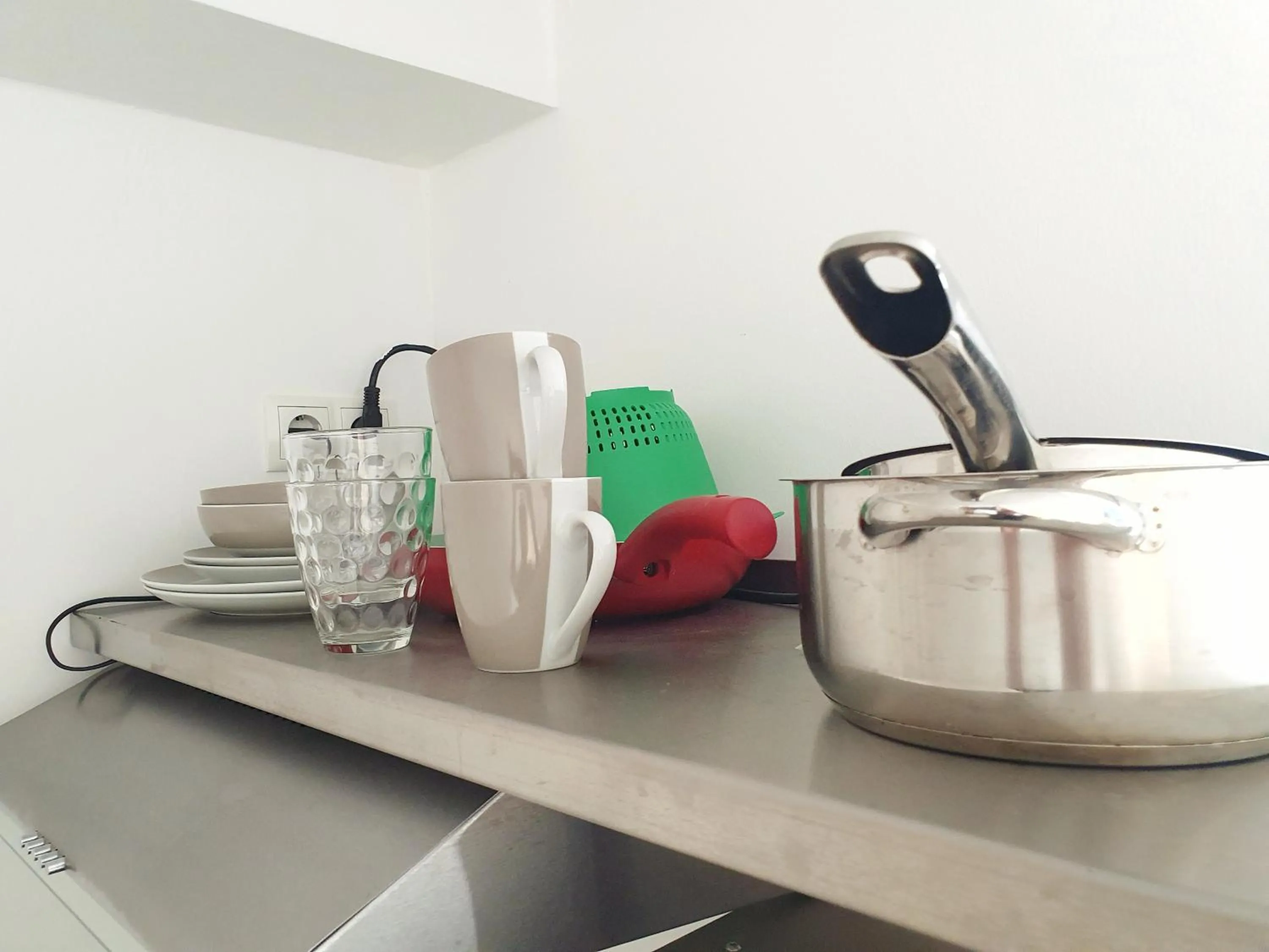 Kitchen or kitchenette in Aparthotel Sanni