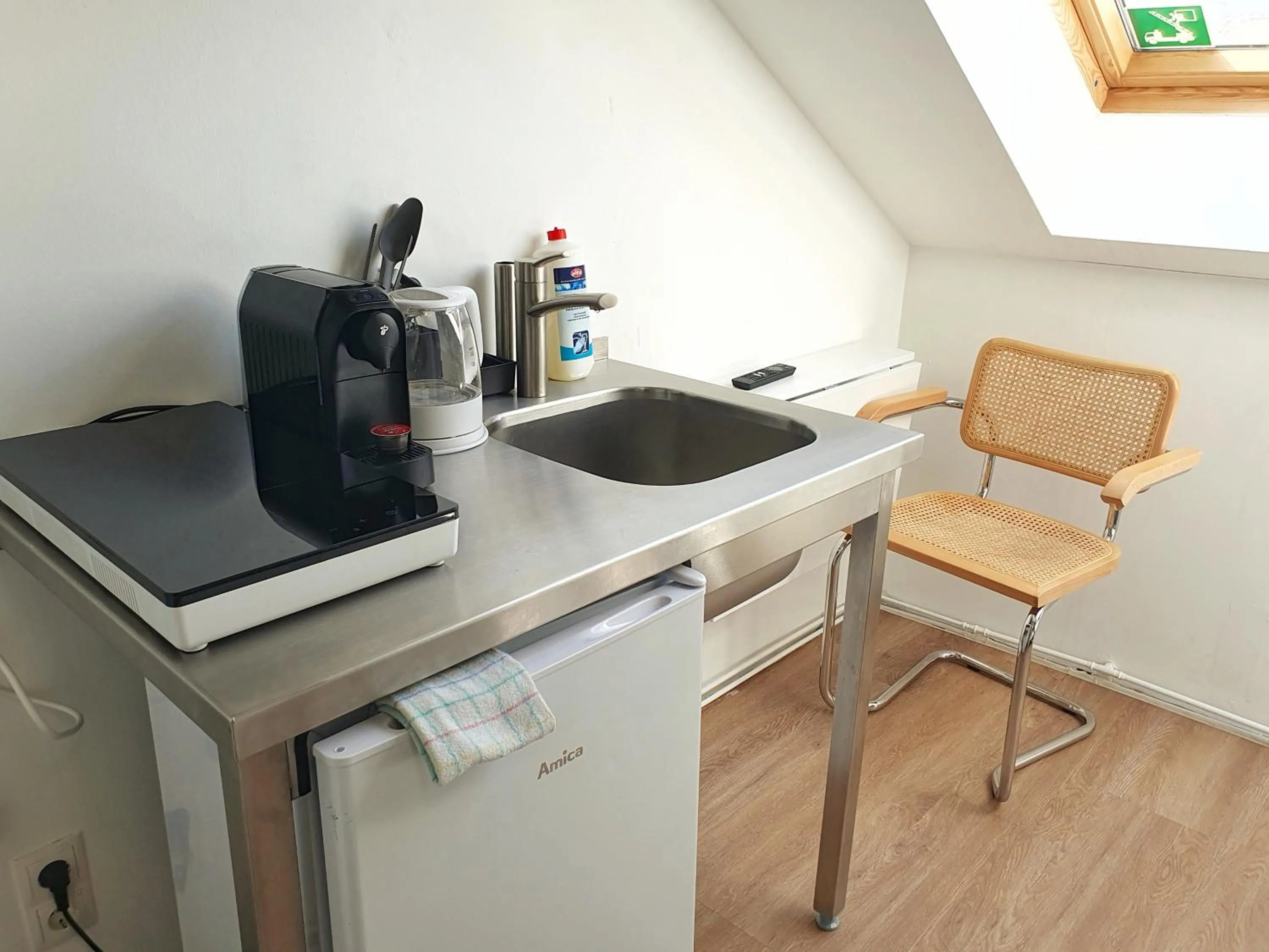 Kitchen or kitchenette in Aparthotel Sanni