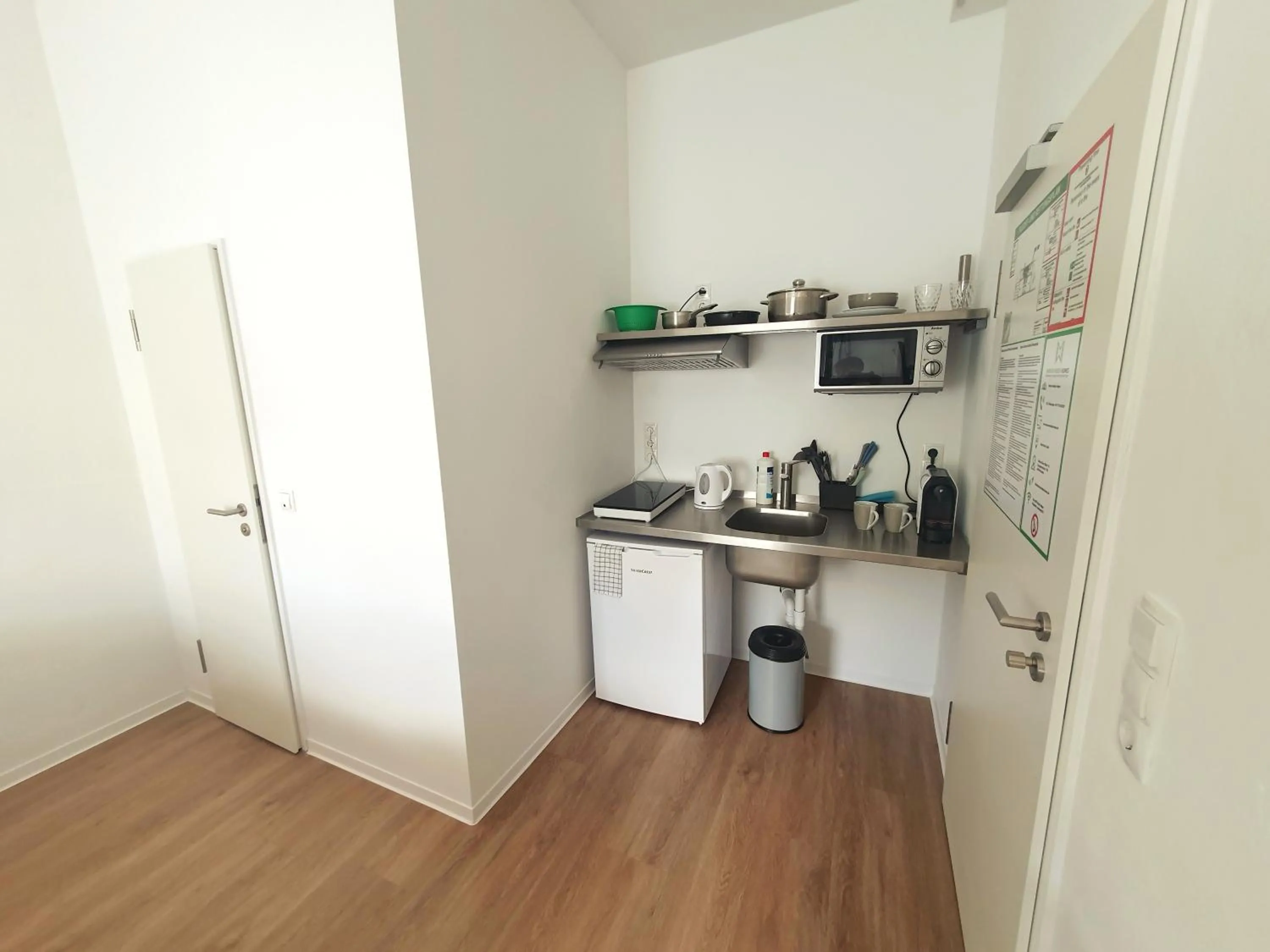 Kitchen or kitchenette in Aparthotel Sanni