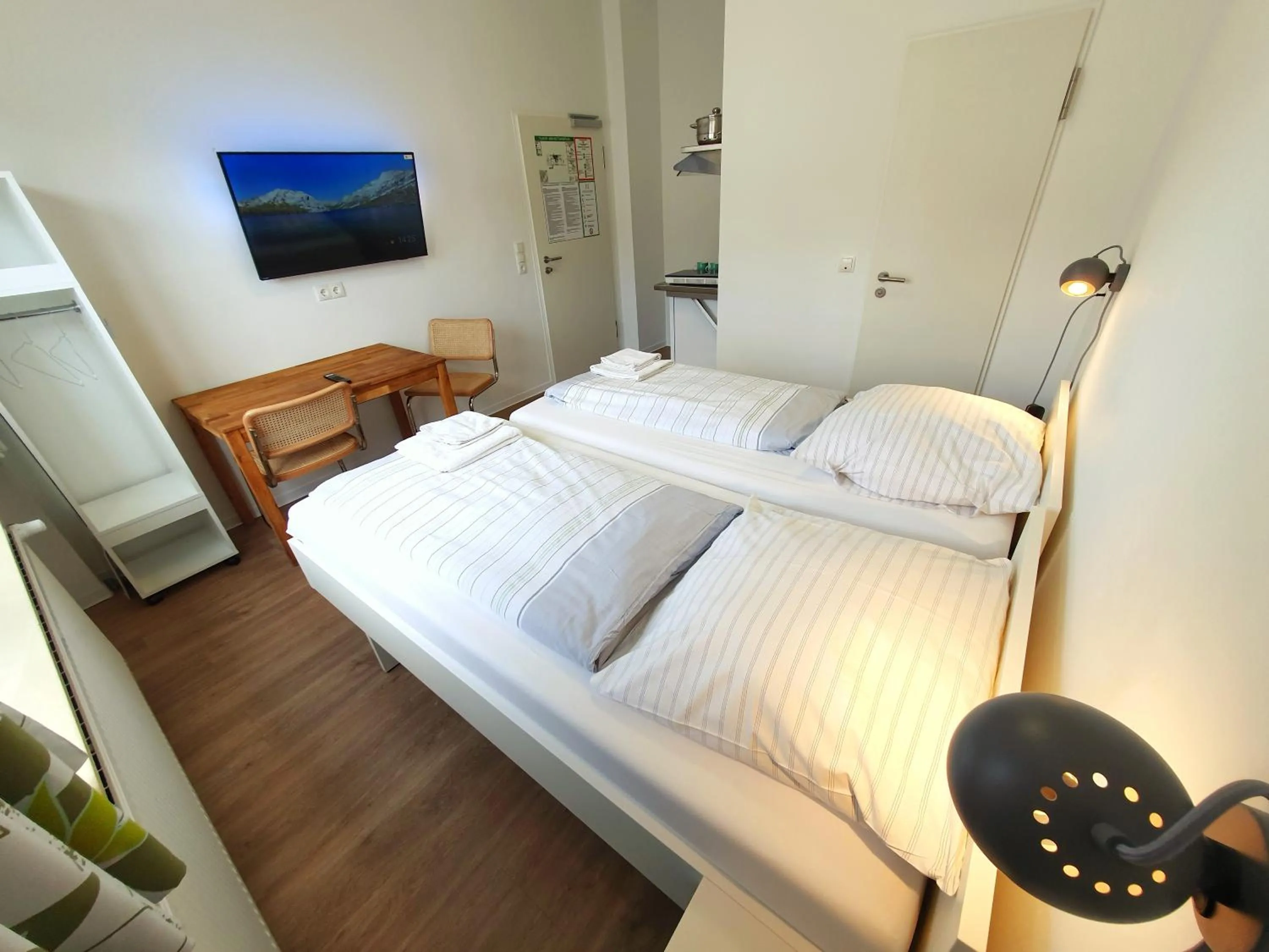 Bed in Aparthotel Sanni