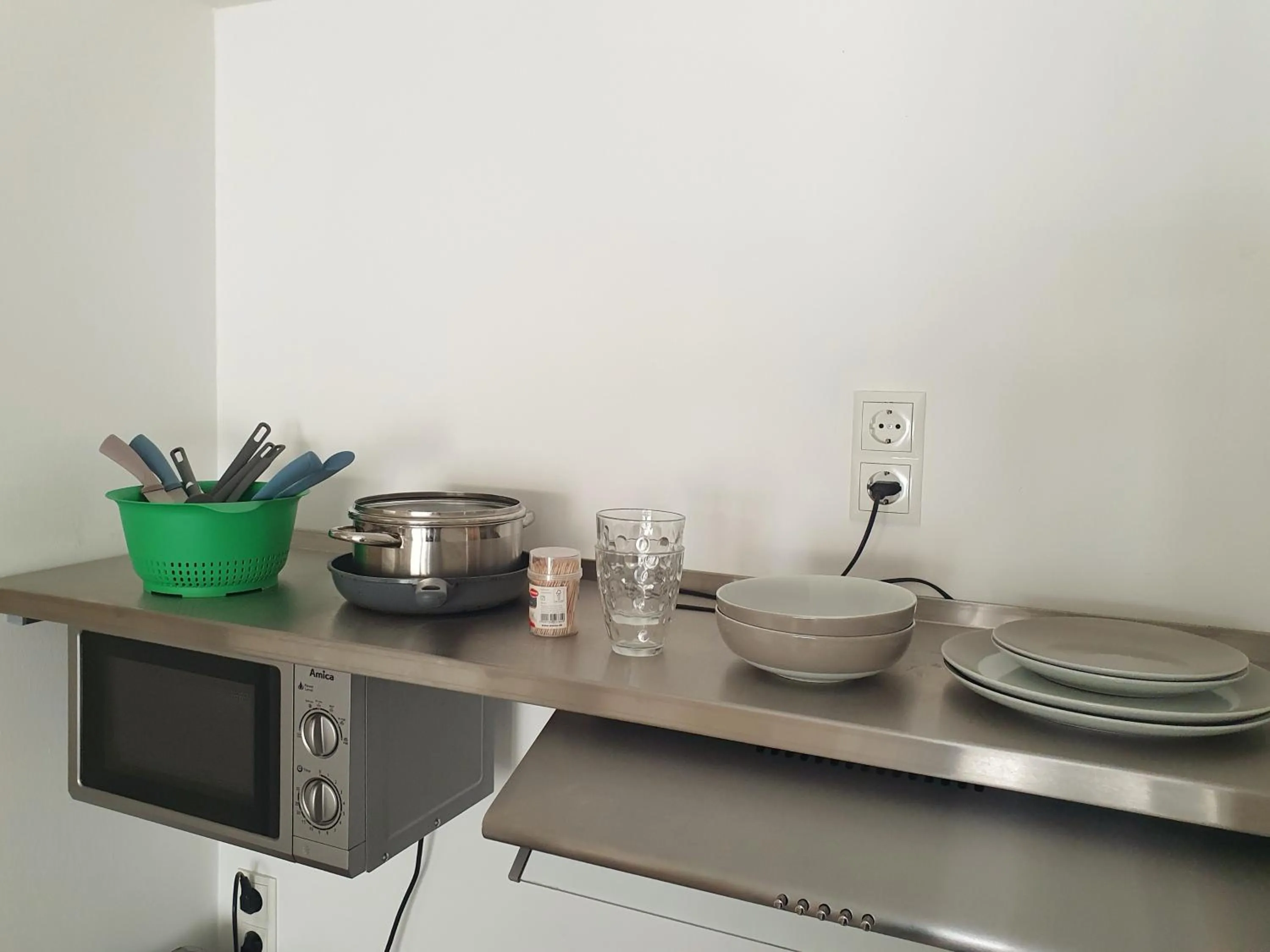 Kitchen or kitchenette in Aparthotel Sanni