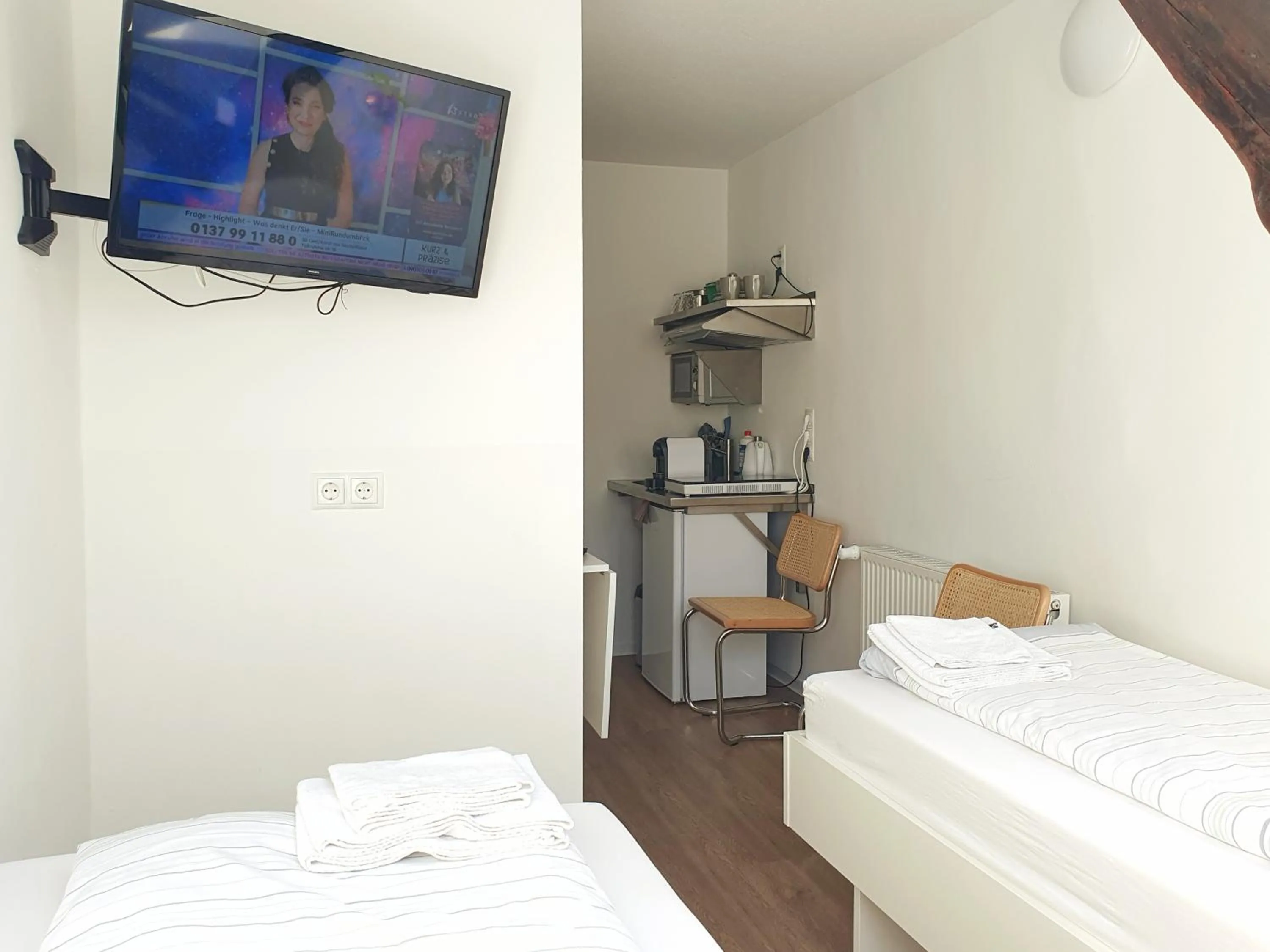 Bed in Aparthotel Sanni