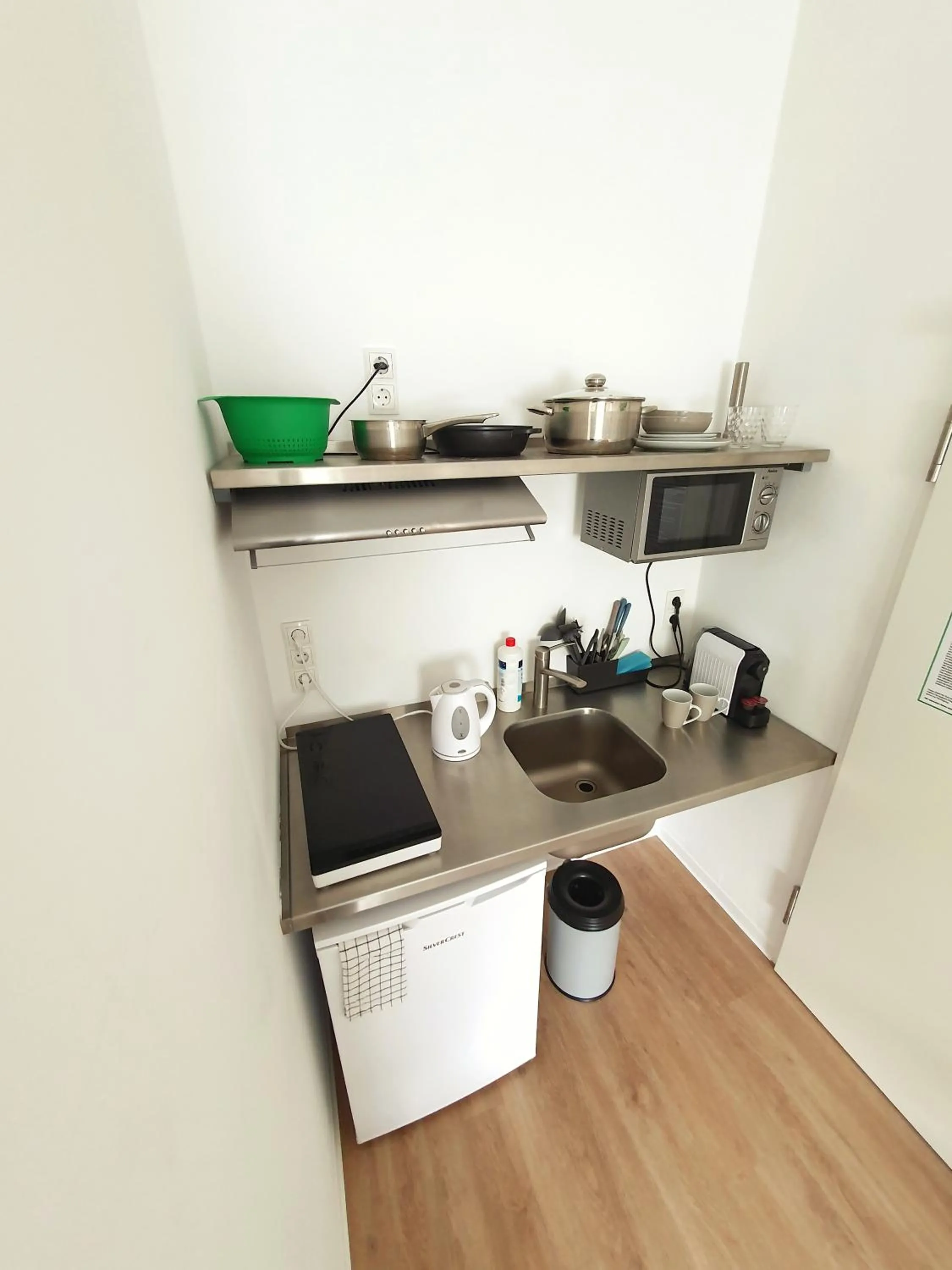 Kitchen or kitchenette in Aparthotel Sanni