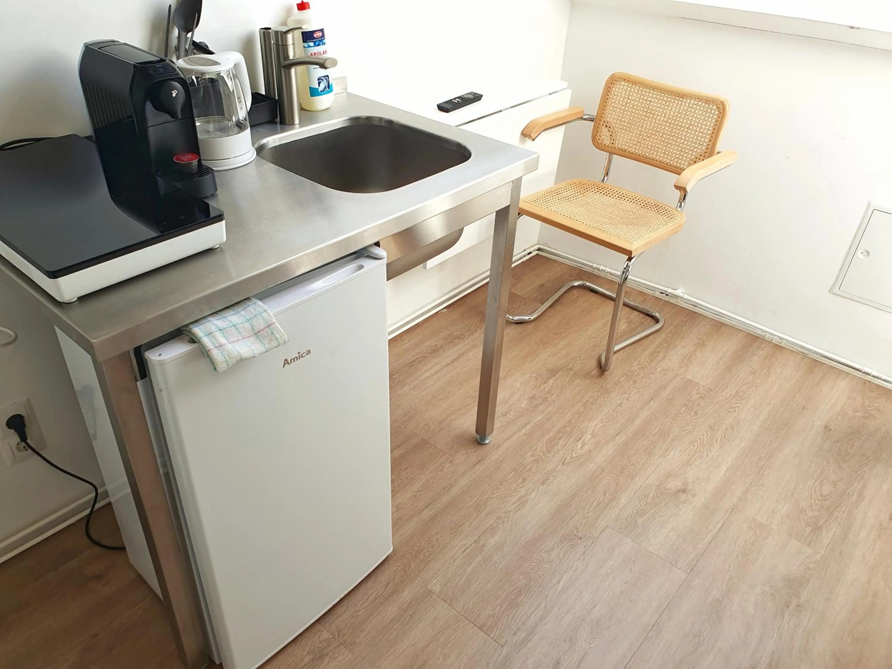 Kitchen or kitchenette in Aparthotel Sanni