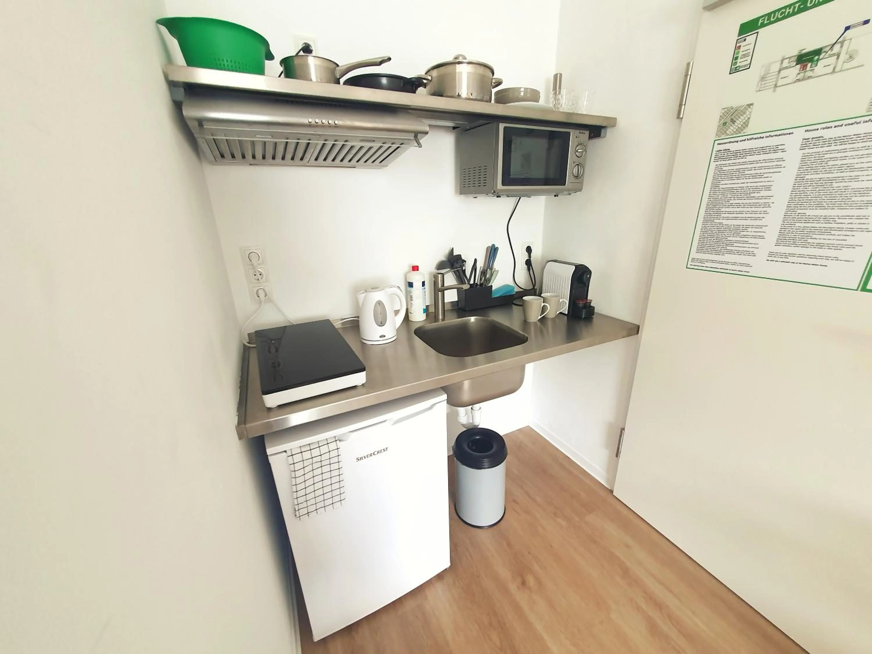 Kitchen or kitchenette in Aparthotel Sanni