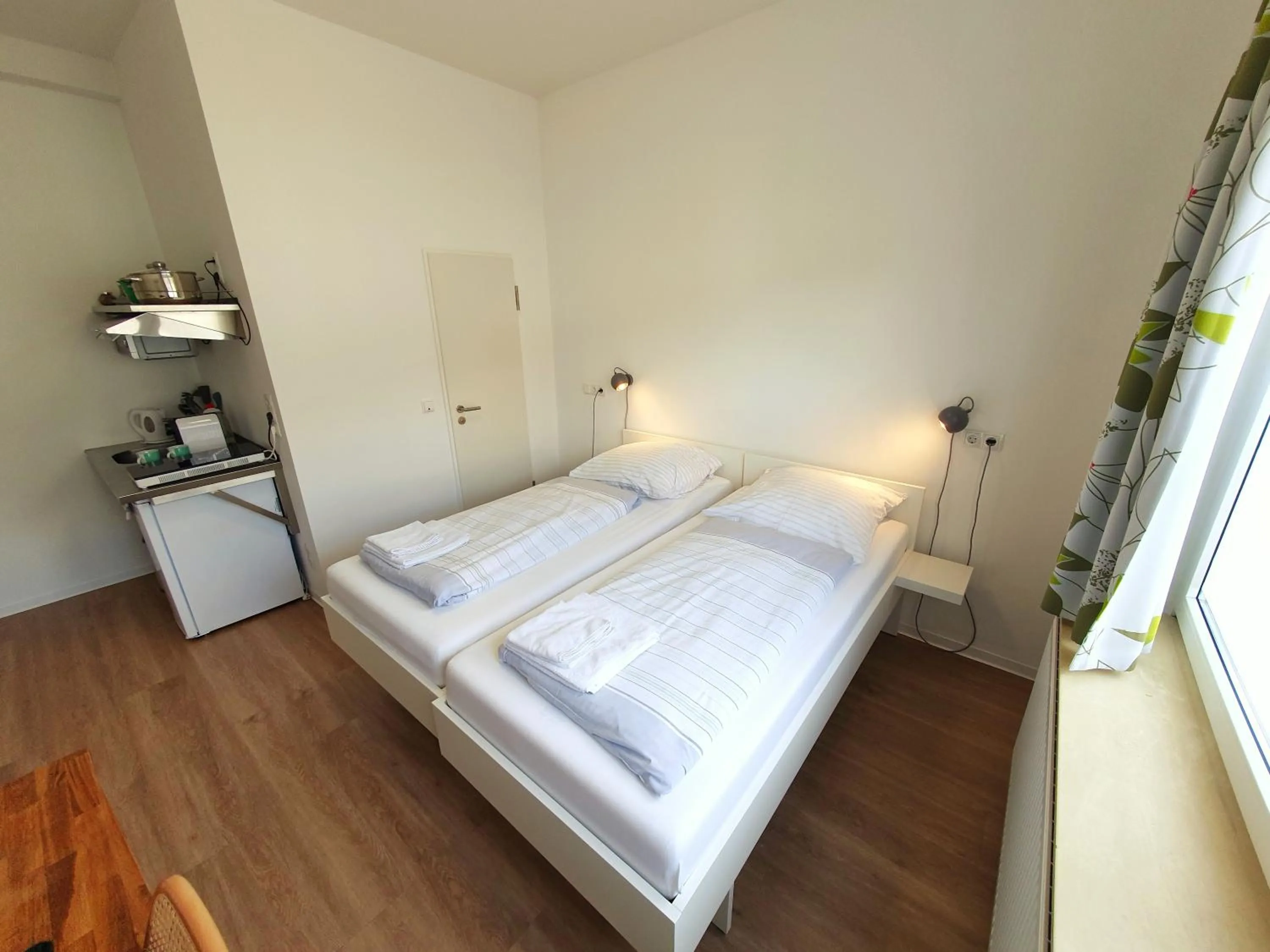 Bed in Aparthotel Sanni