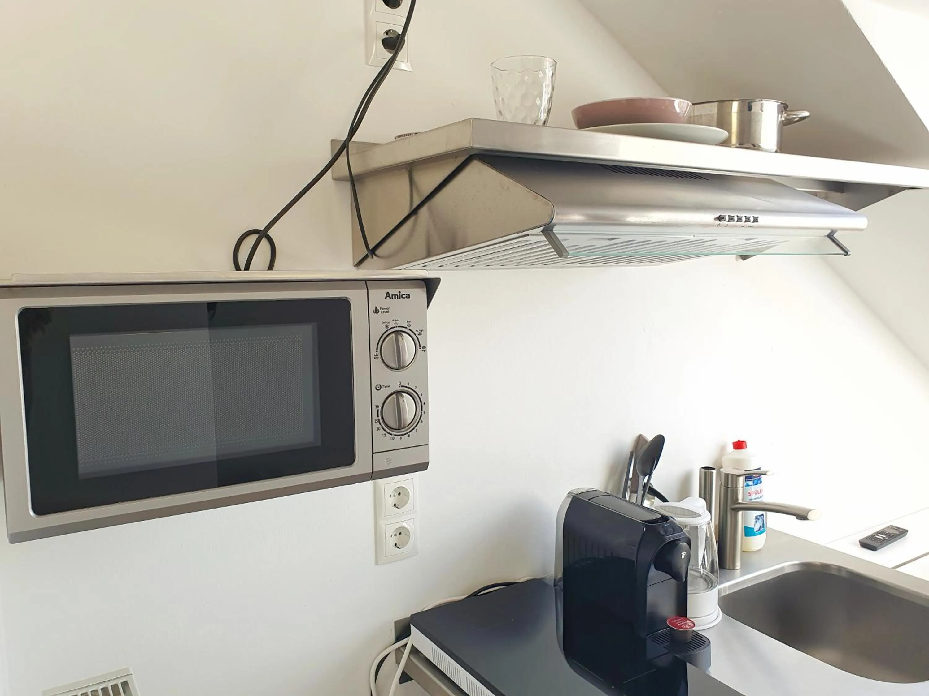 Kitchen or kitchenette in Aparthotel Sanni
