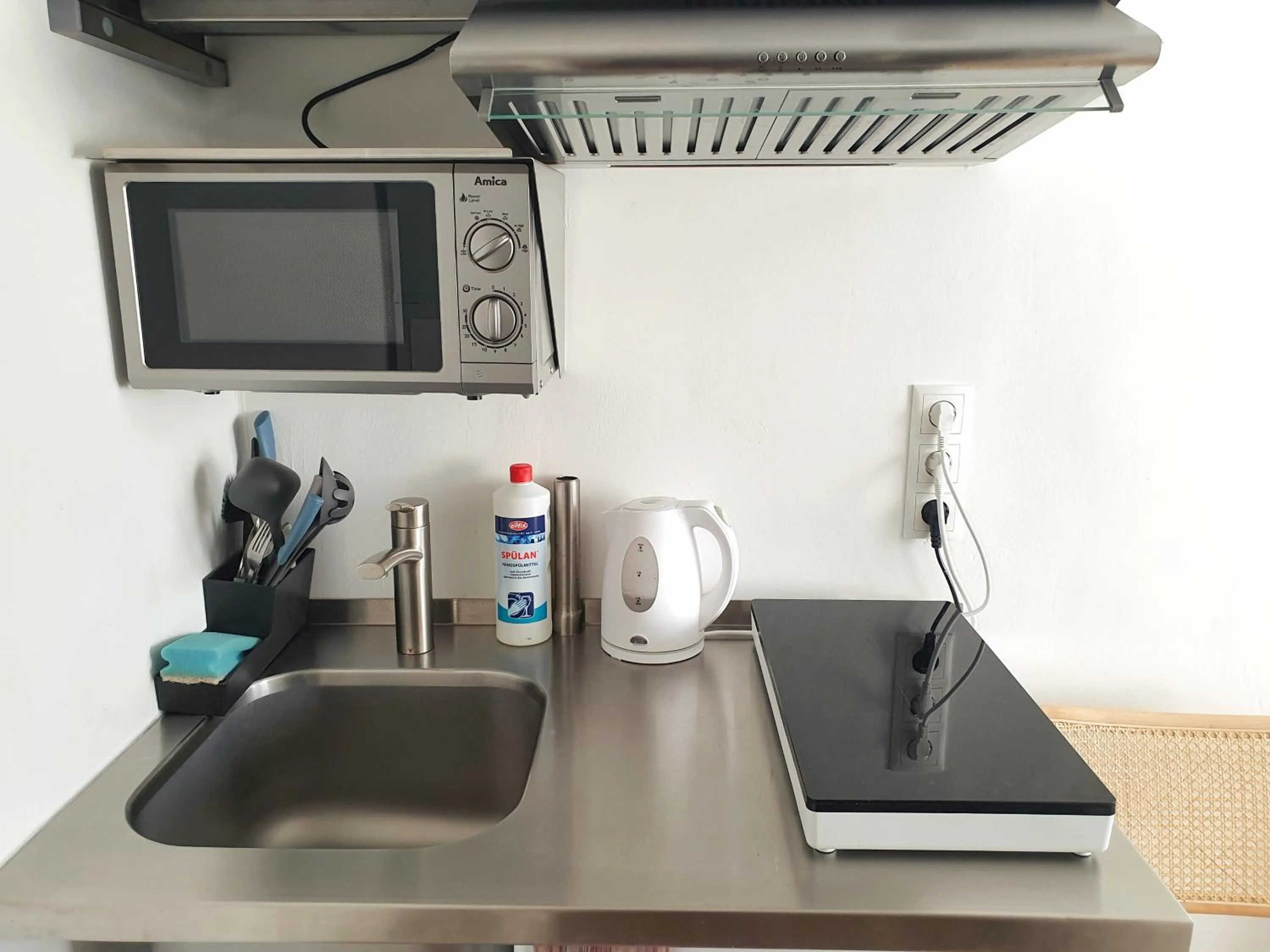 Kitchen or kitchenette in Aparthotel Sanni