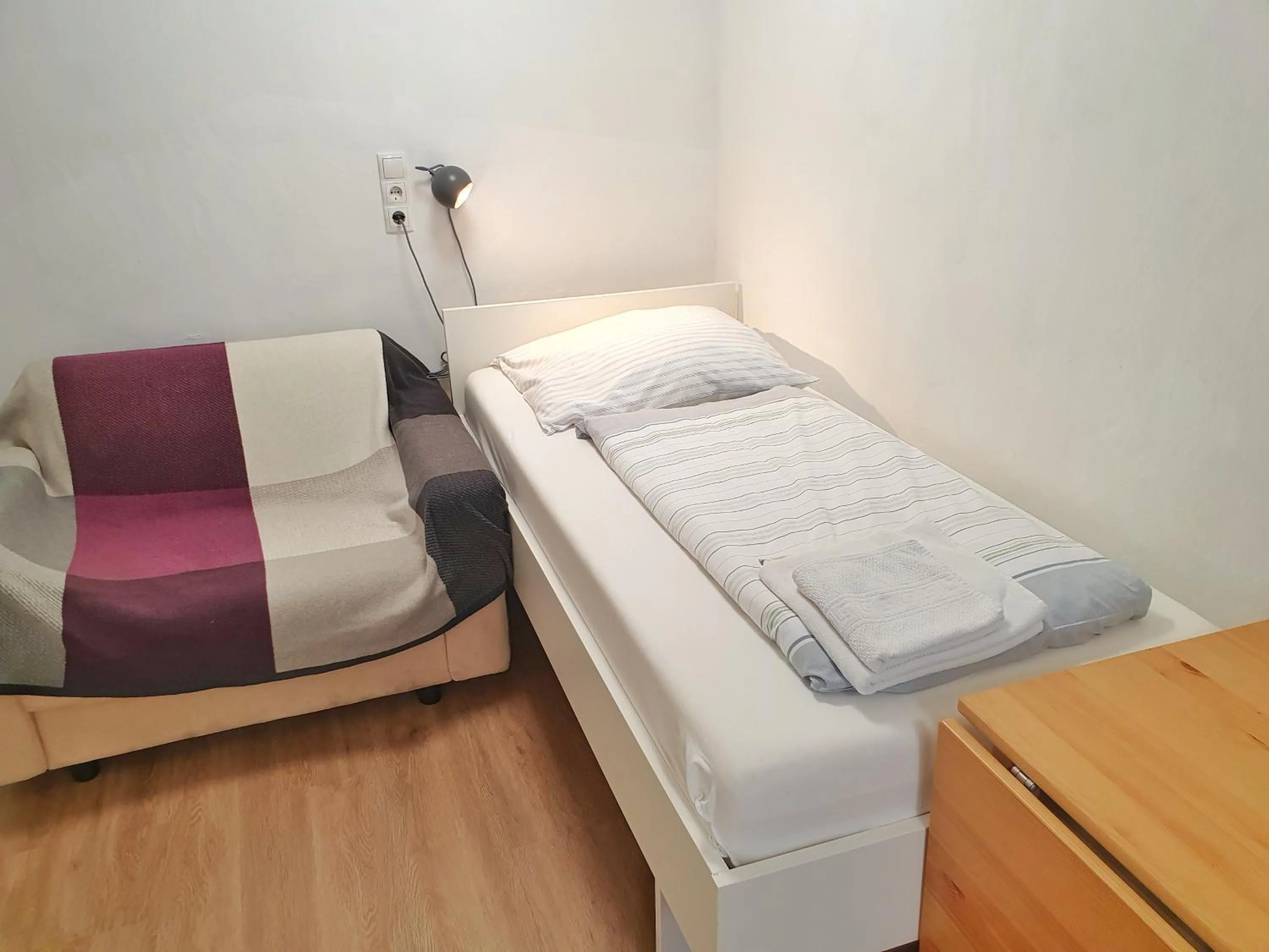 Bed in Aparthotel Sanni