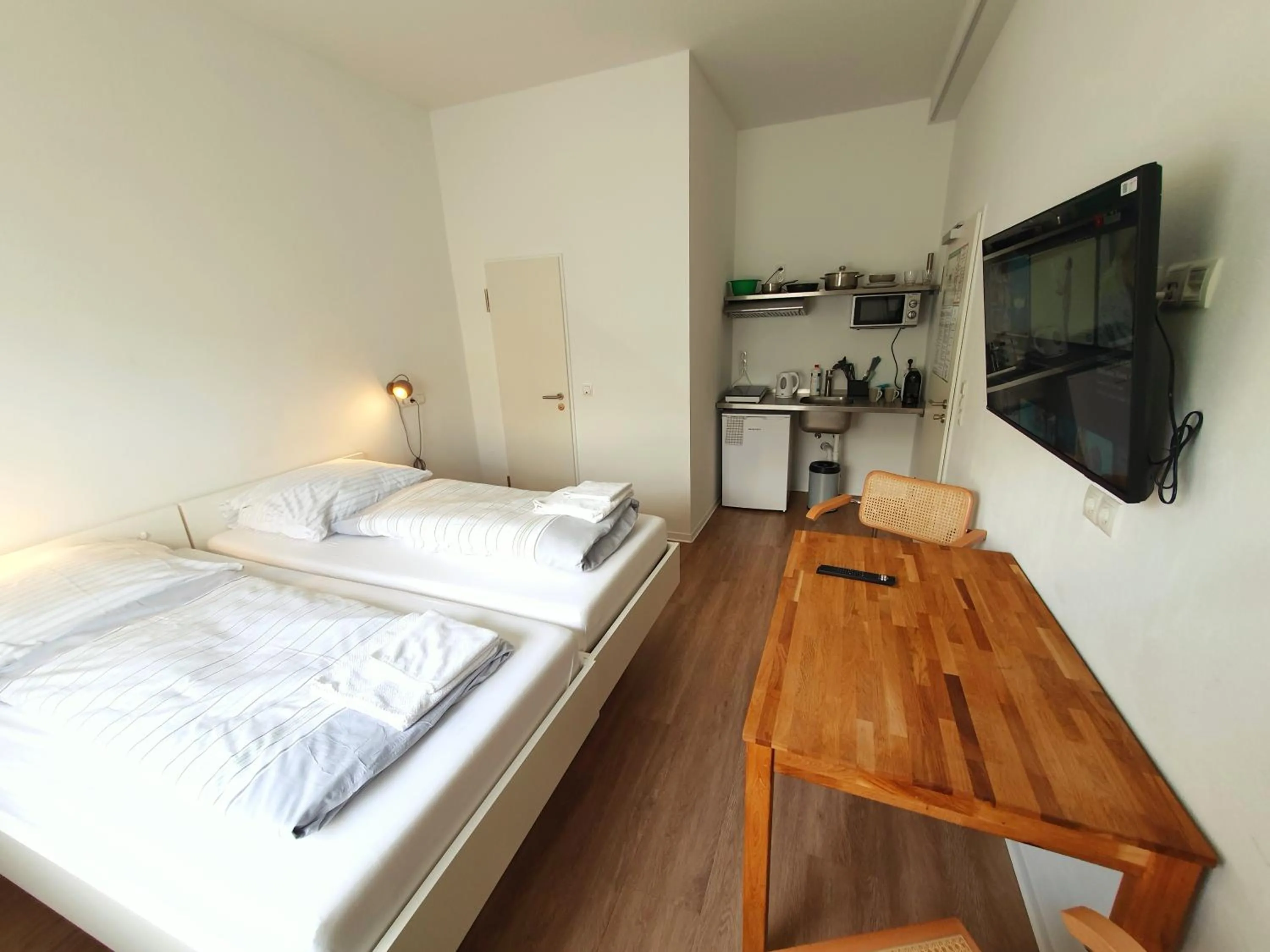 Bed in Aparthotel Sanni