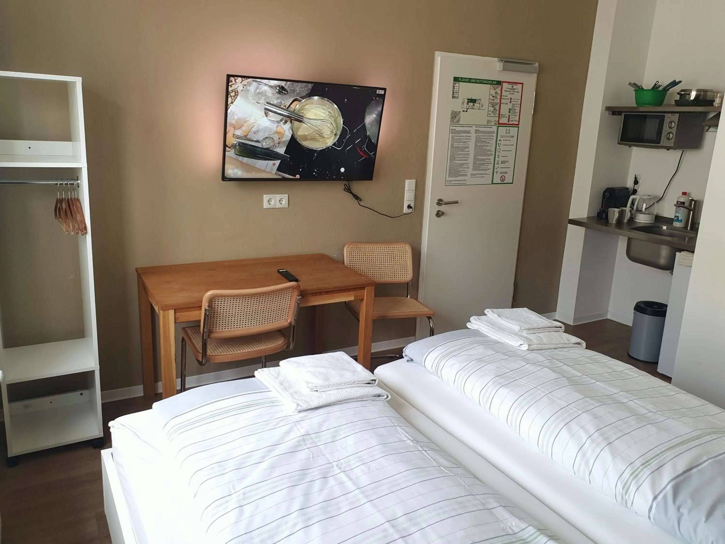 Bed in Aparthotel Sanni