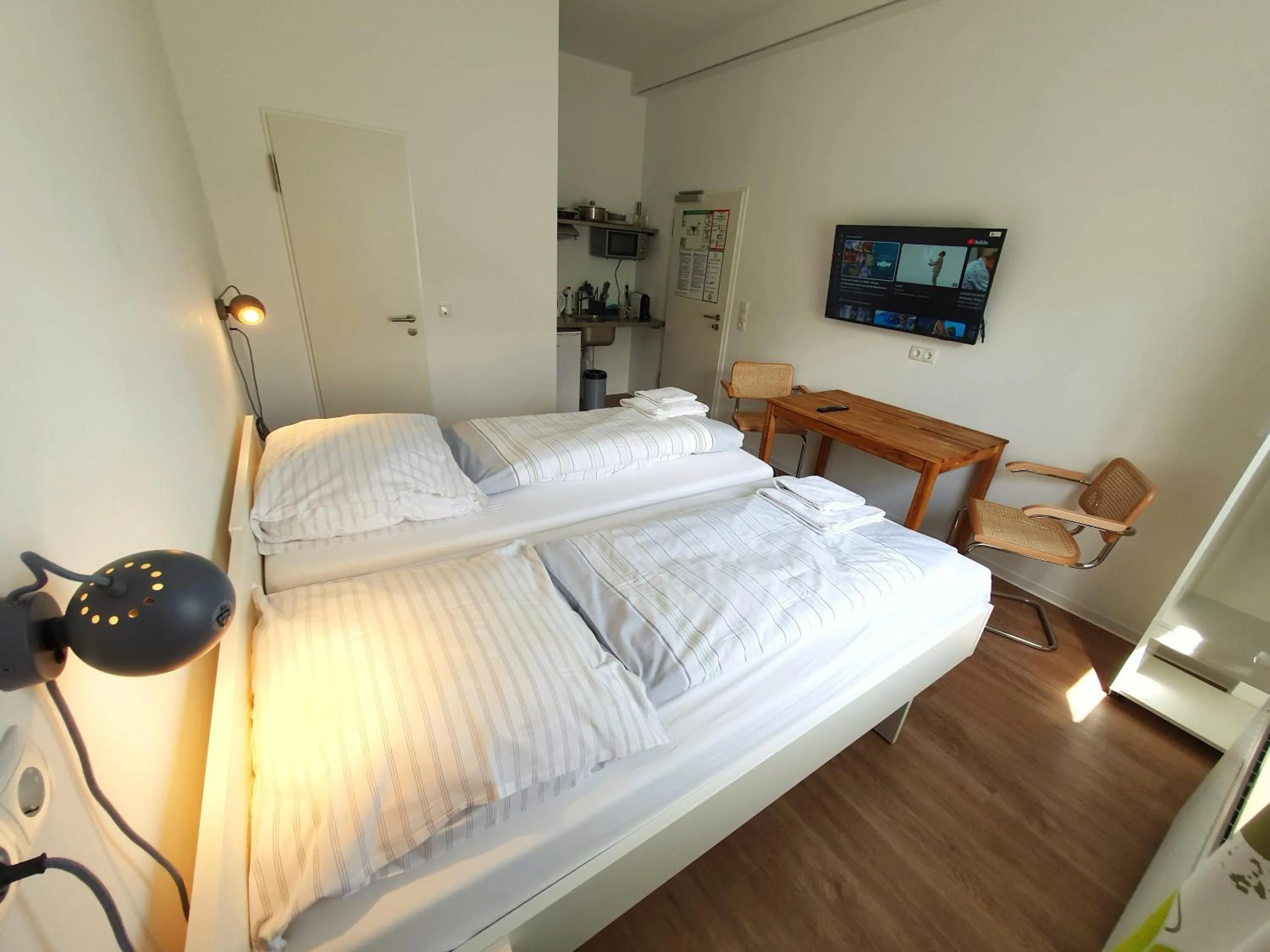 Bed in Aparthotel Sanni