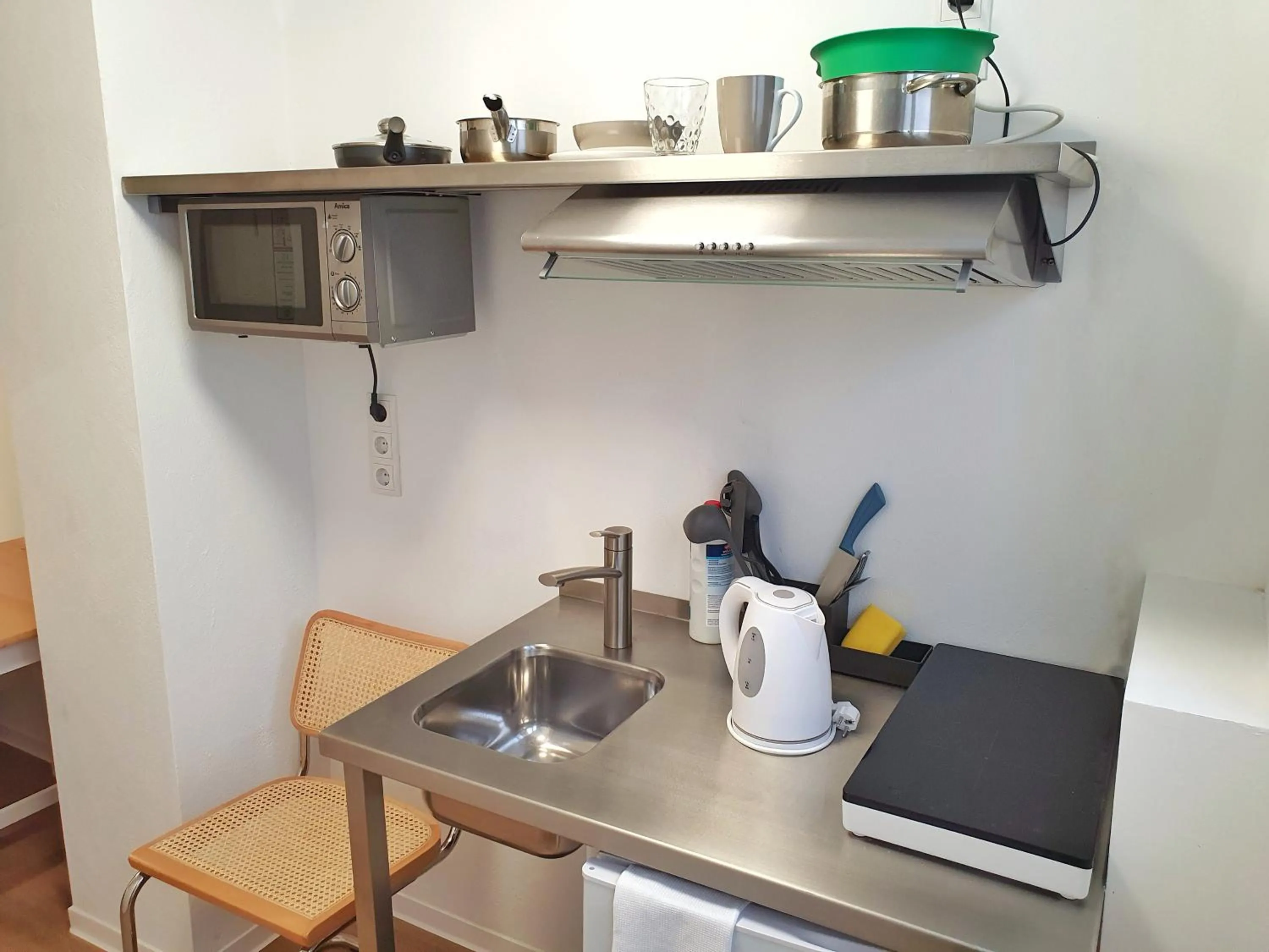 Kitchen or kitchenette in Aparthotel Sanni