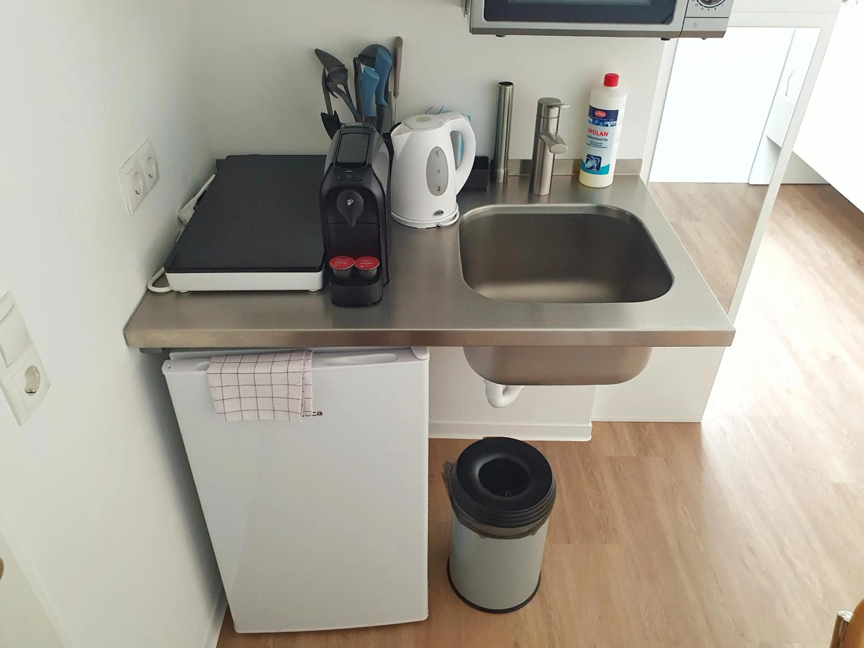 Kitchen or kitchenette in Aparthotel Sanni