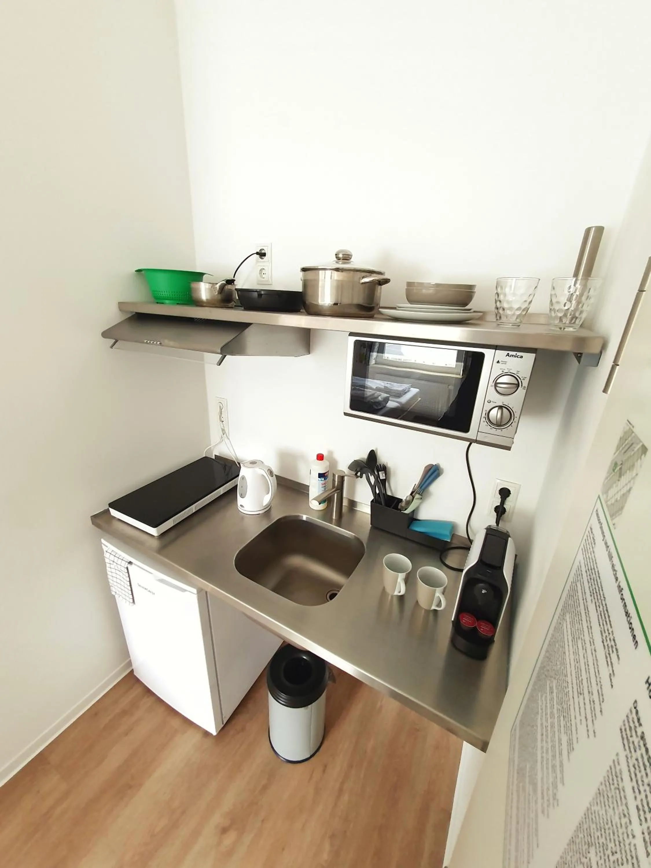 Kitchen or kitchenette in Aparthotel Sanni