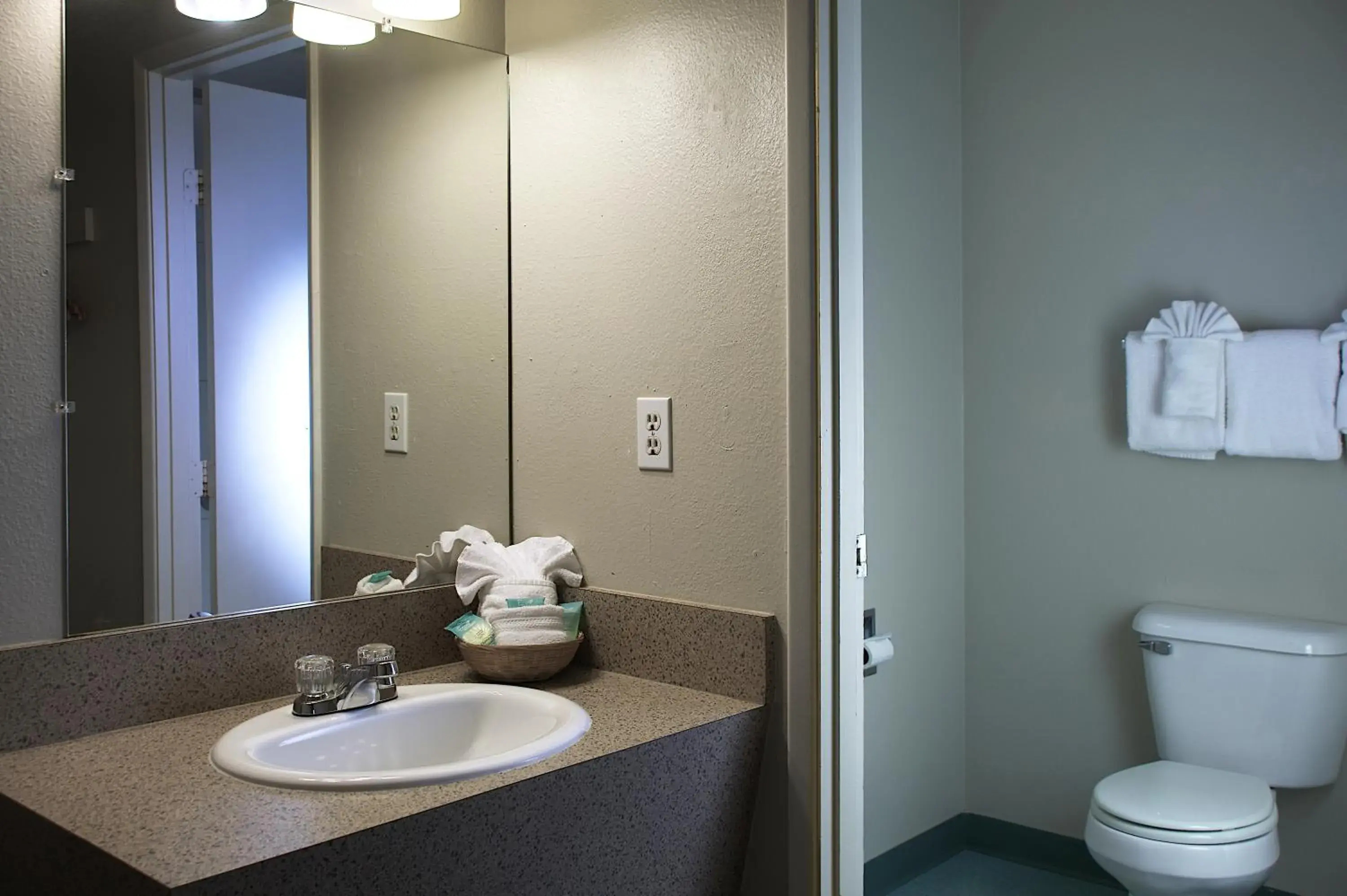 Queen Room with Two Queen Beds with Kitchen in Aladdin Inn and Suites Queen Room with Two Queen Beds with Kitchen in Aladdin Inn and Suites