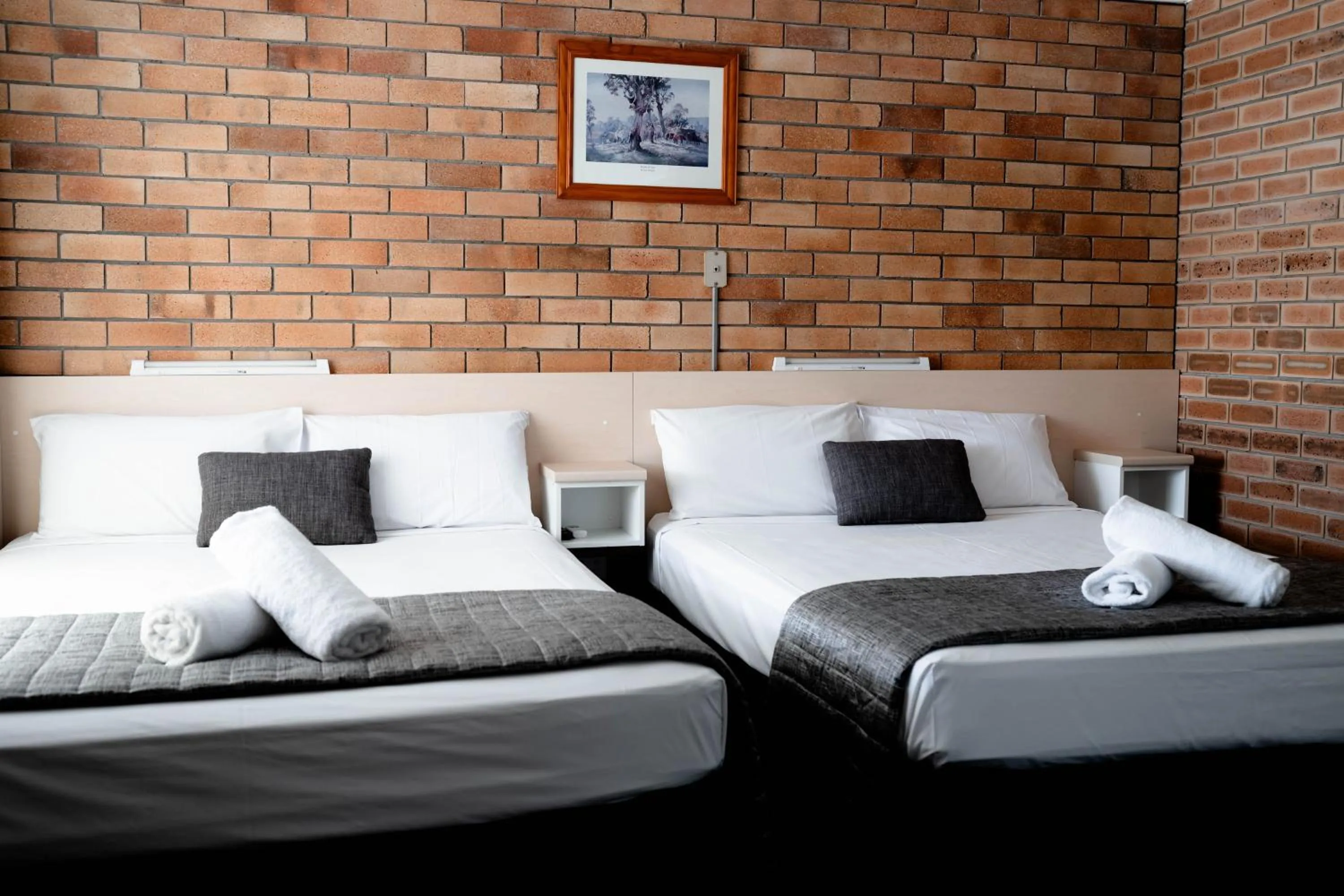 Bed in Buckaroo Motor Inn