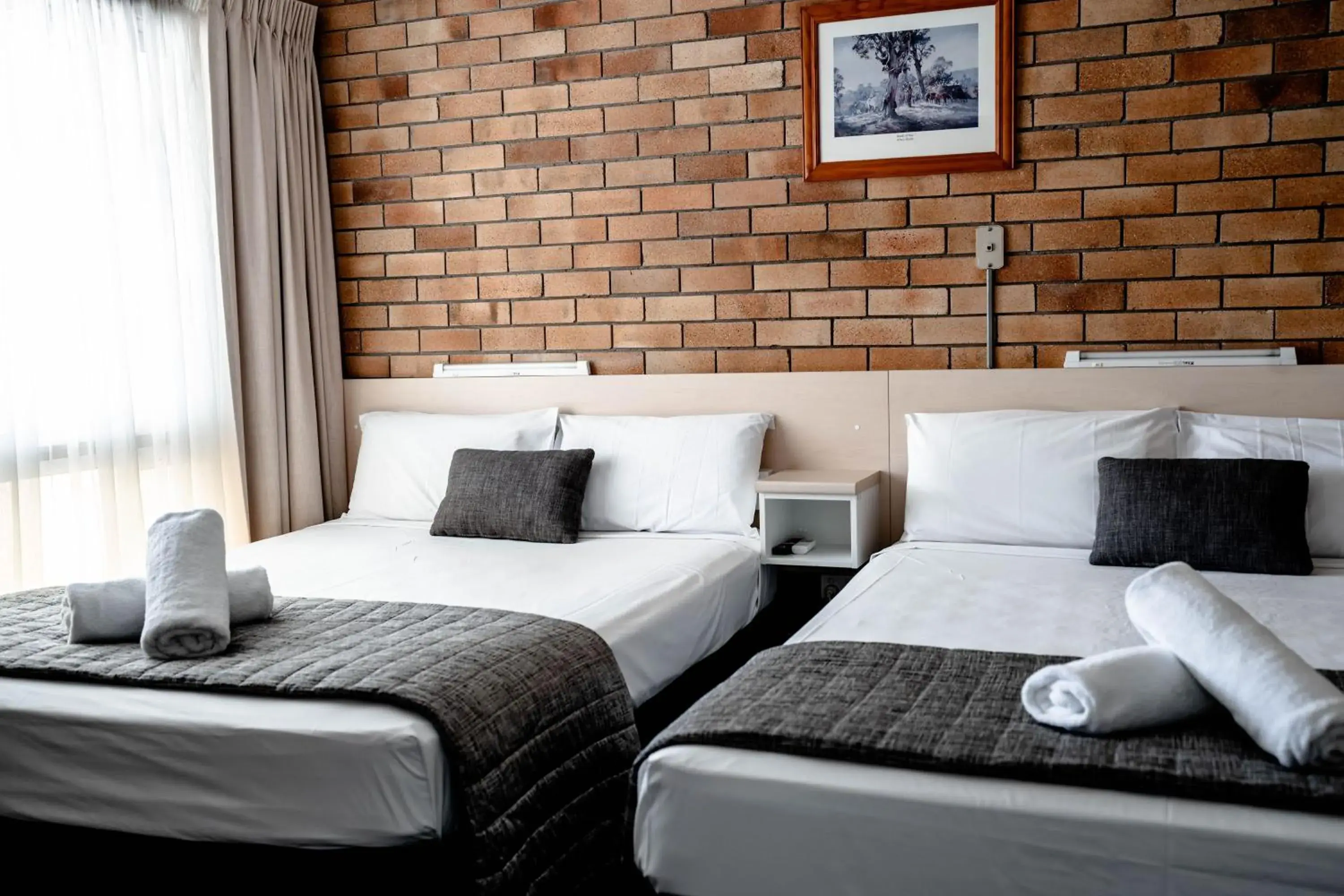 Queen Room with Two Queen Beds in Buckaroo Motor Inn Queen Room with Two Queen Beds in Buckaroo Motor Inn