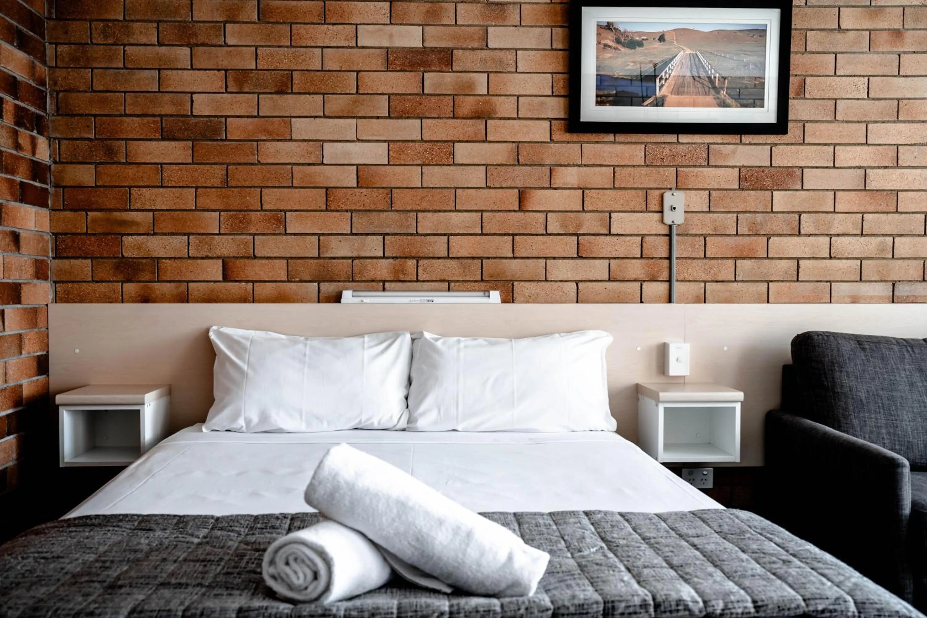 Bed in Buckaroo Motor Inn