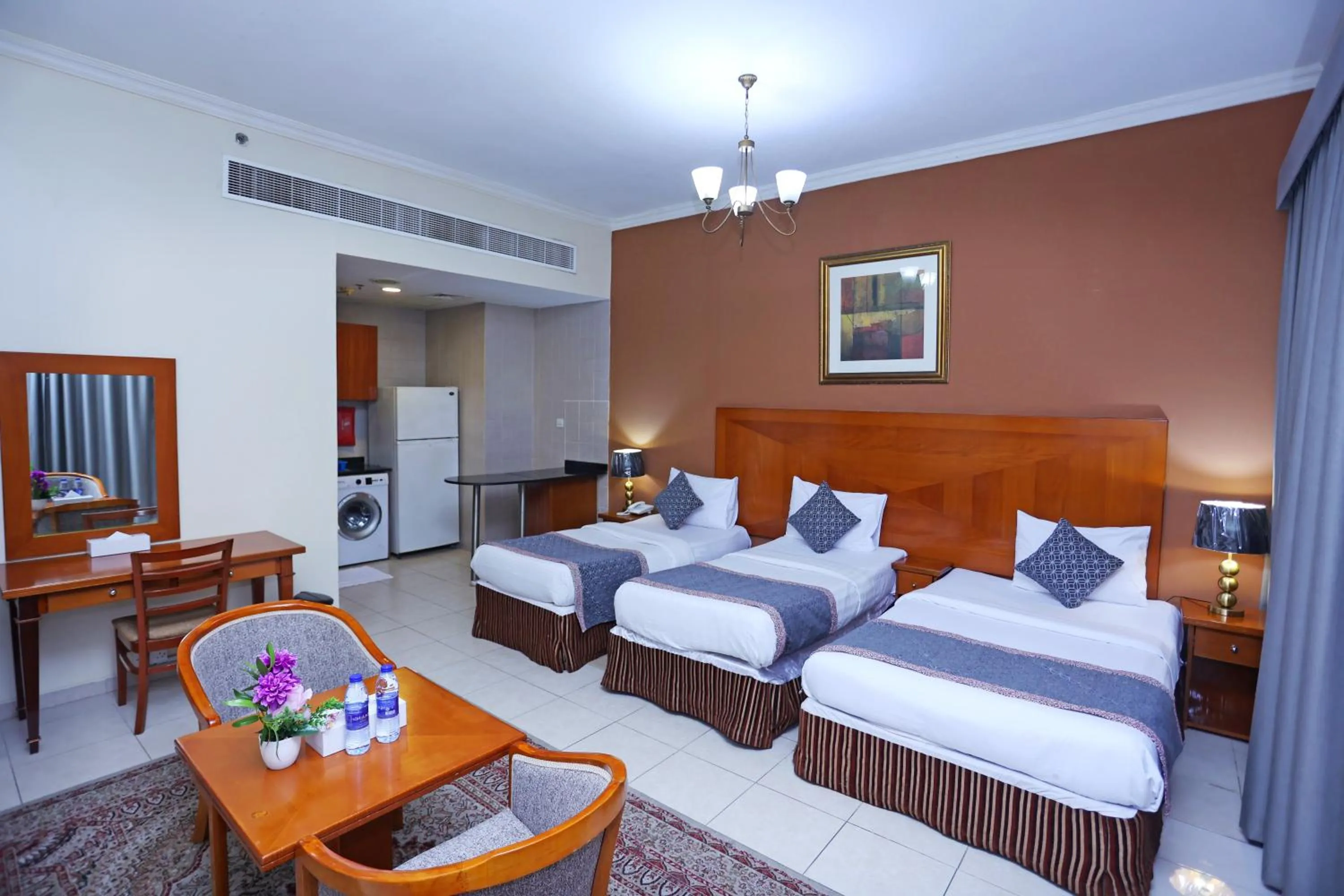 Bed in Icon Hotel Apartments