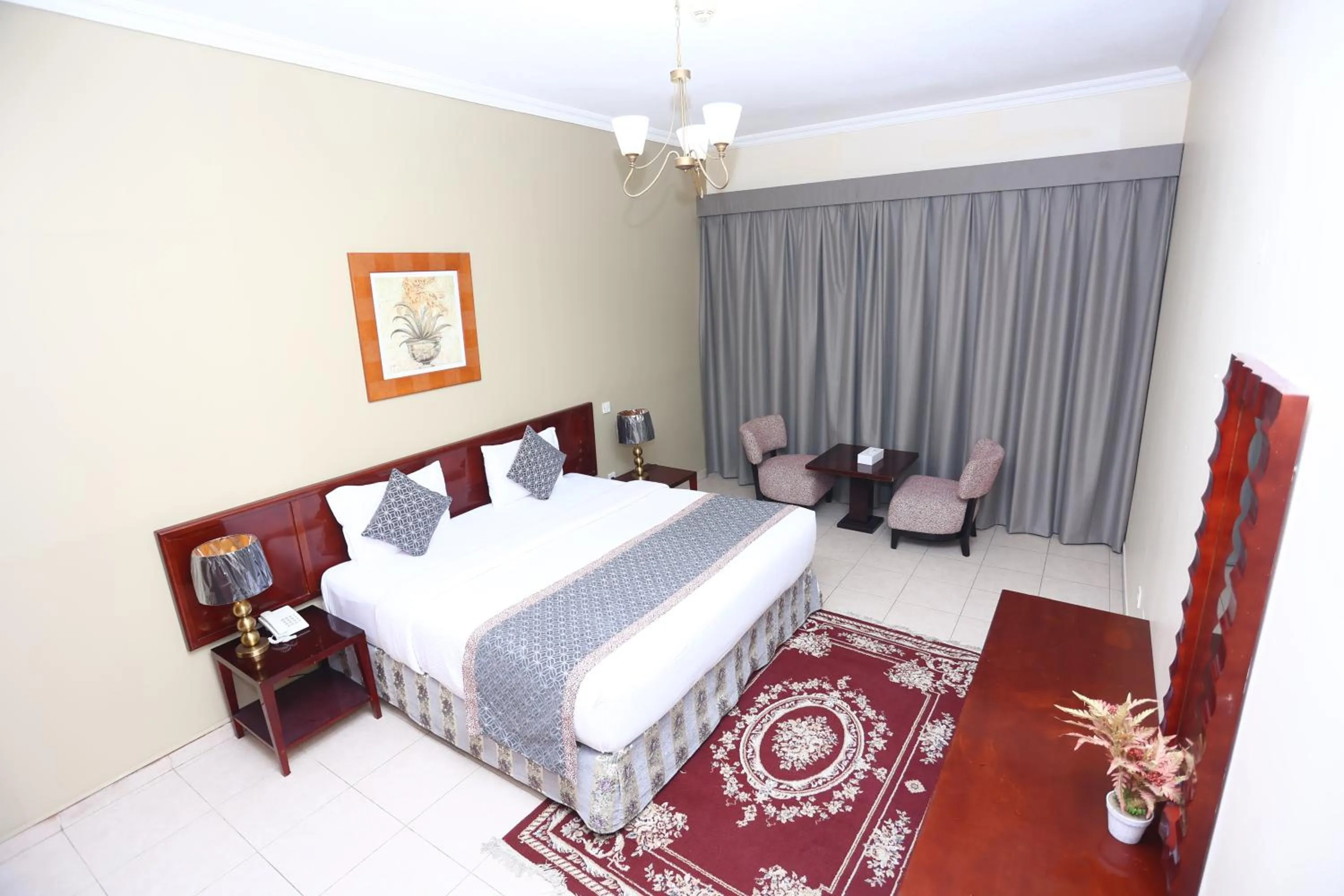 Bed in Icon Hotel Apartments