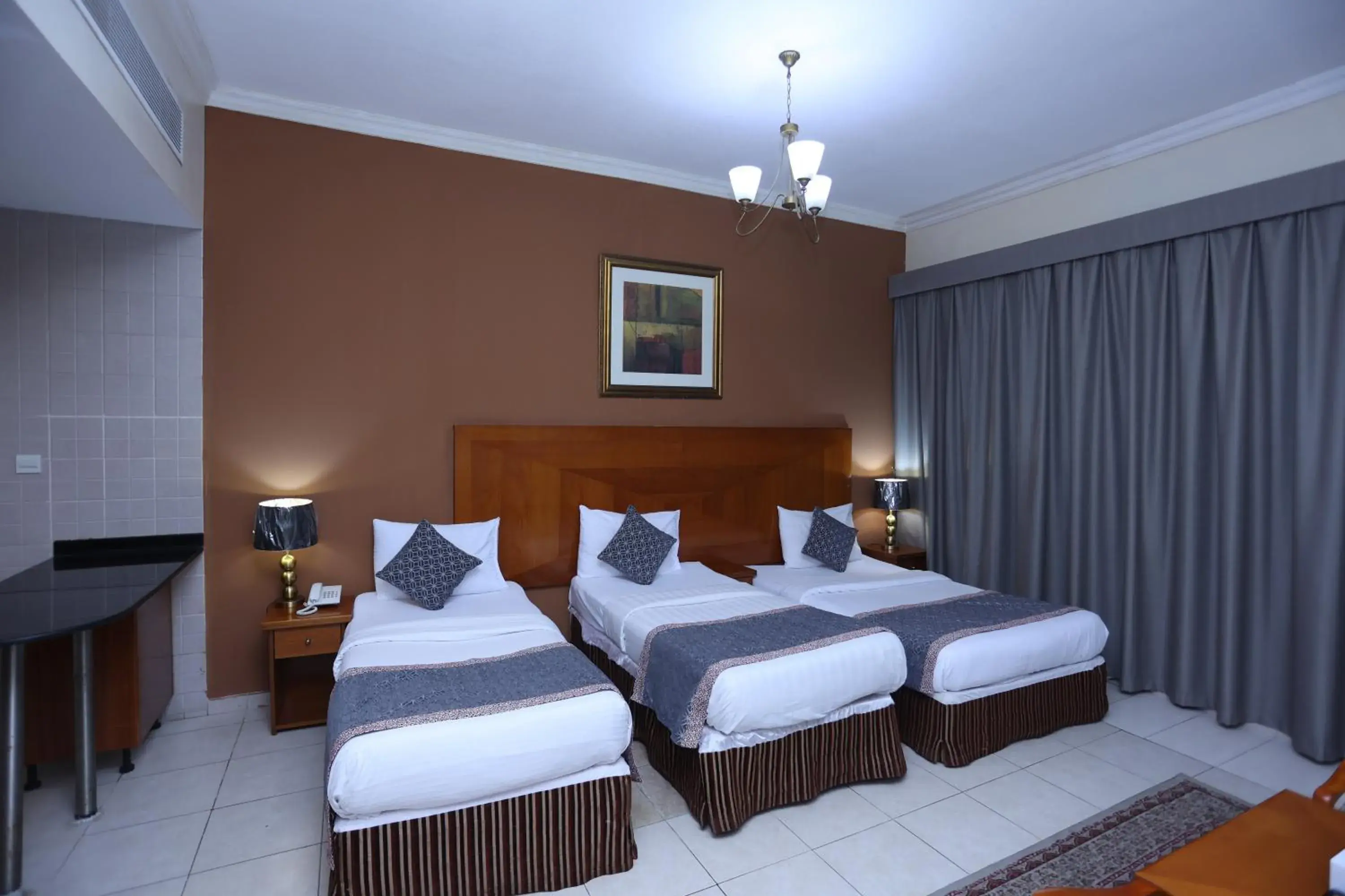 Bed in Icon Hotel Apartments Bed in Icon Hotel Apartments