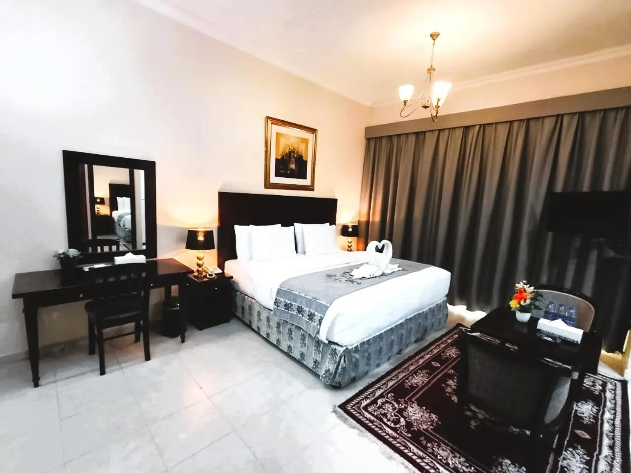 Bed in Icon Hotel Apartments