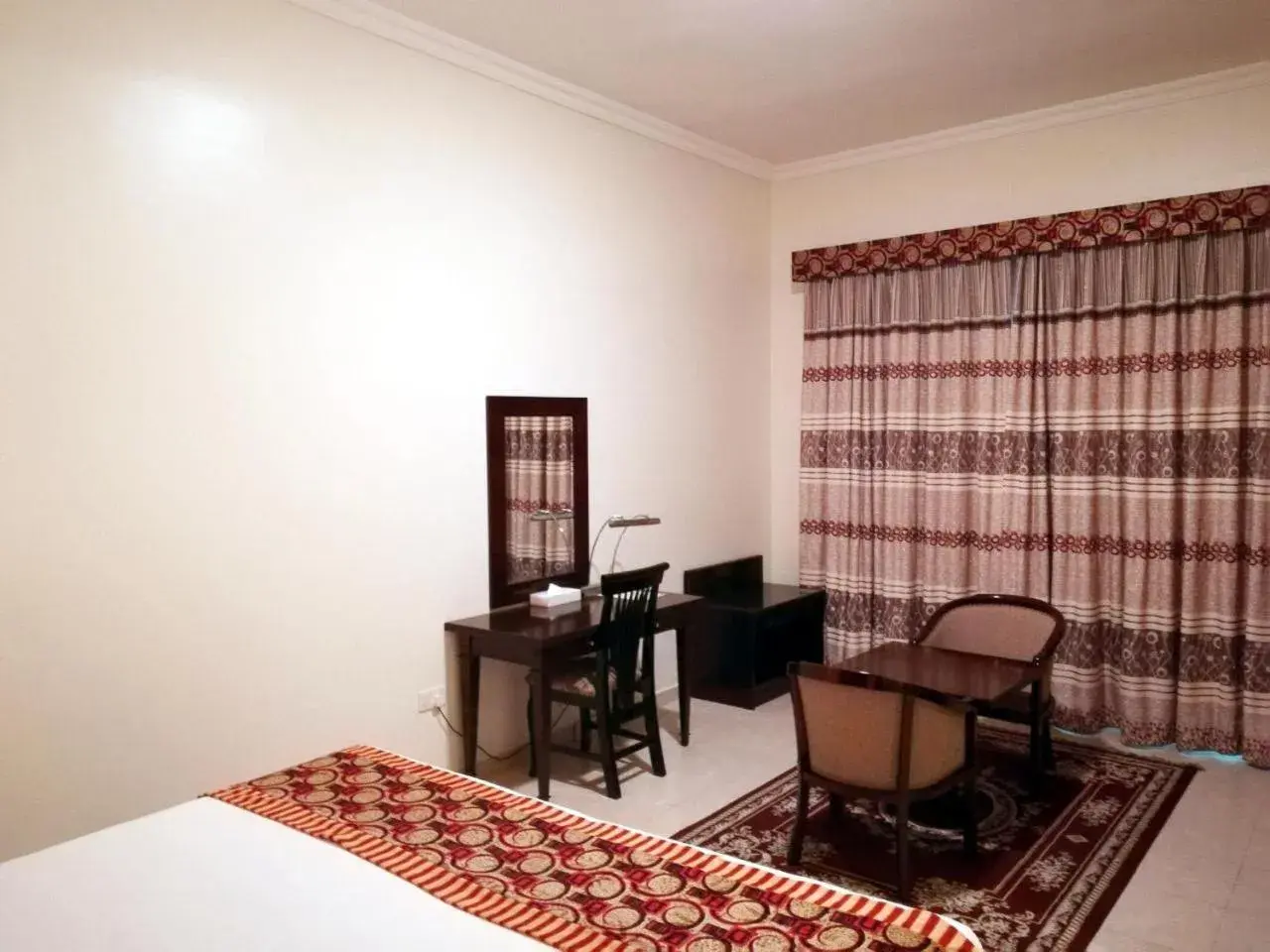 Bed in Icon Hotel Apartments Bed in Icon Hotel Apartments