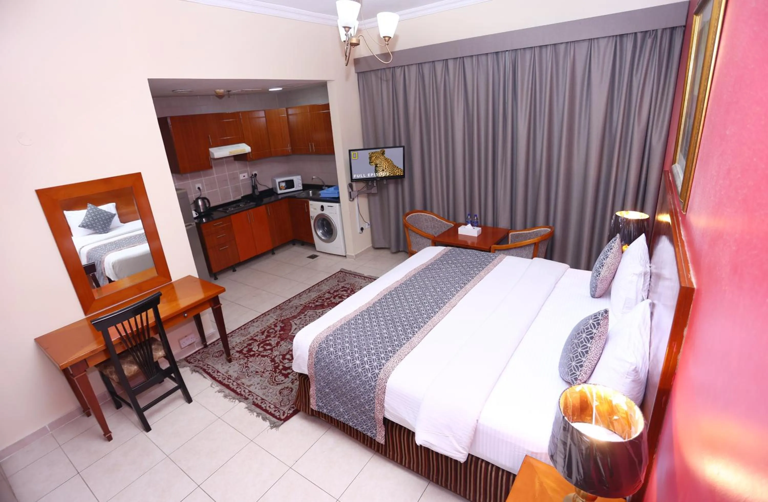 Bed in Icon Hotel Apartments