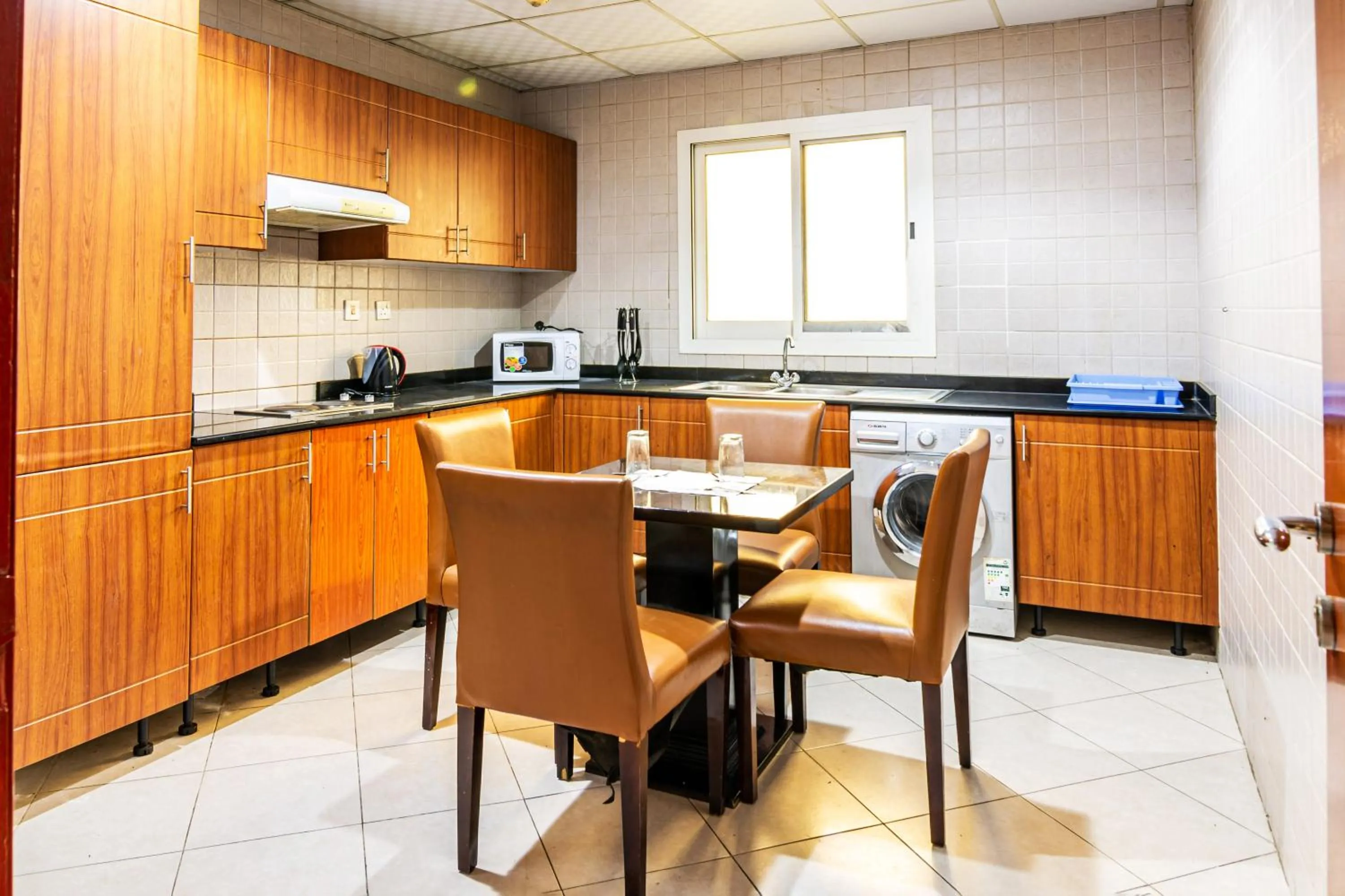 Kitchen or kitchenette in Icon Hotel Apartments