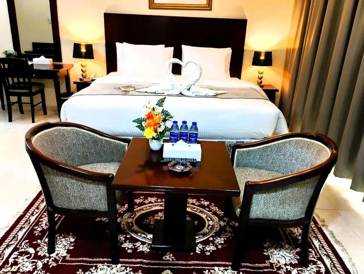 Bed in Icon Hotel Apartments