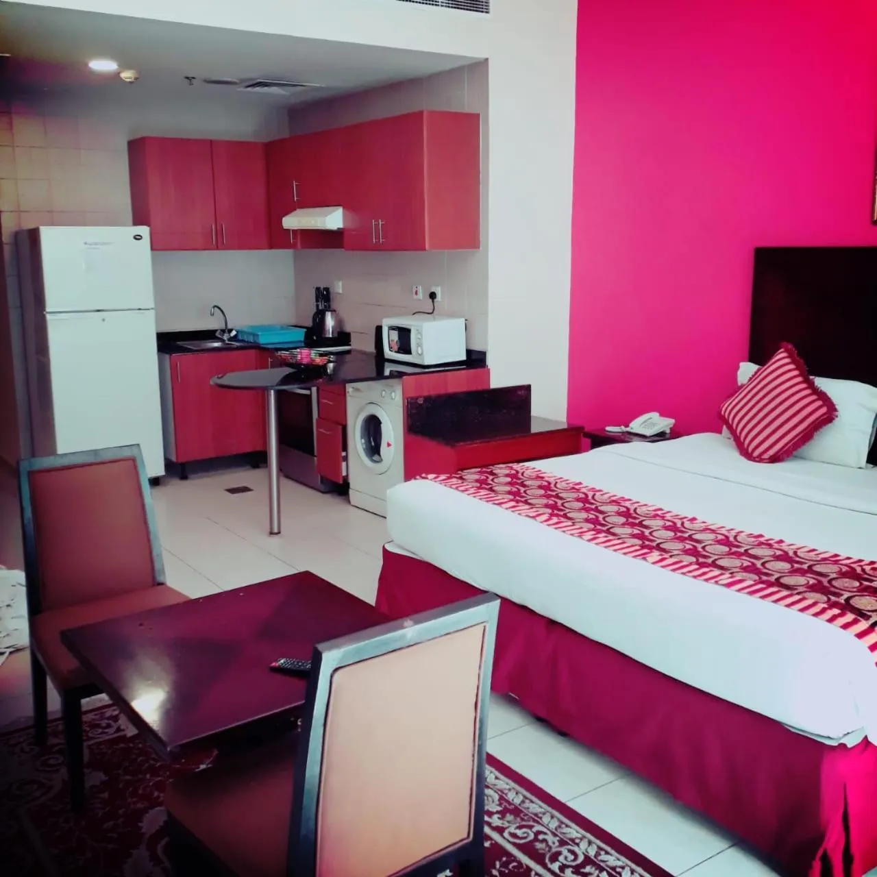 Bed in Icon Hotel Apartments