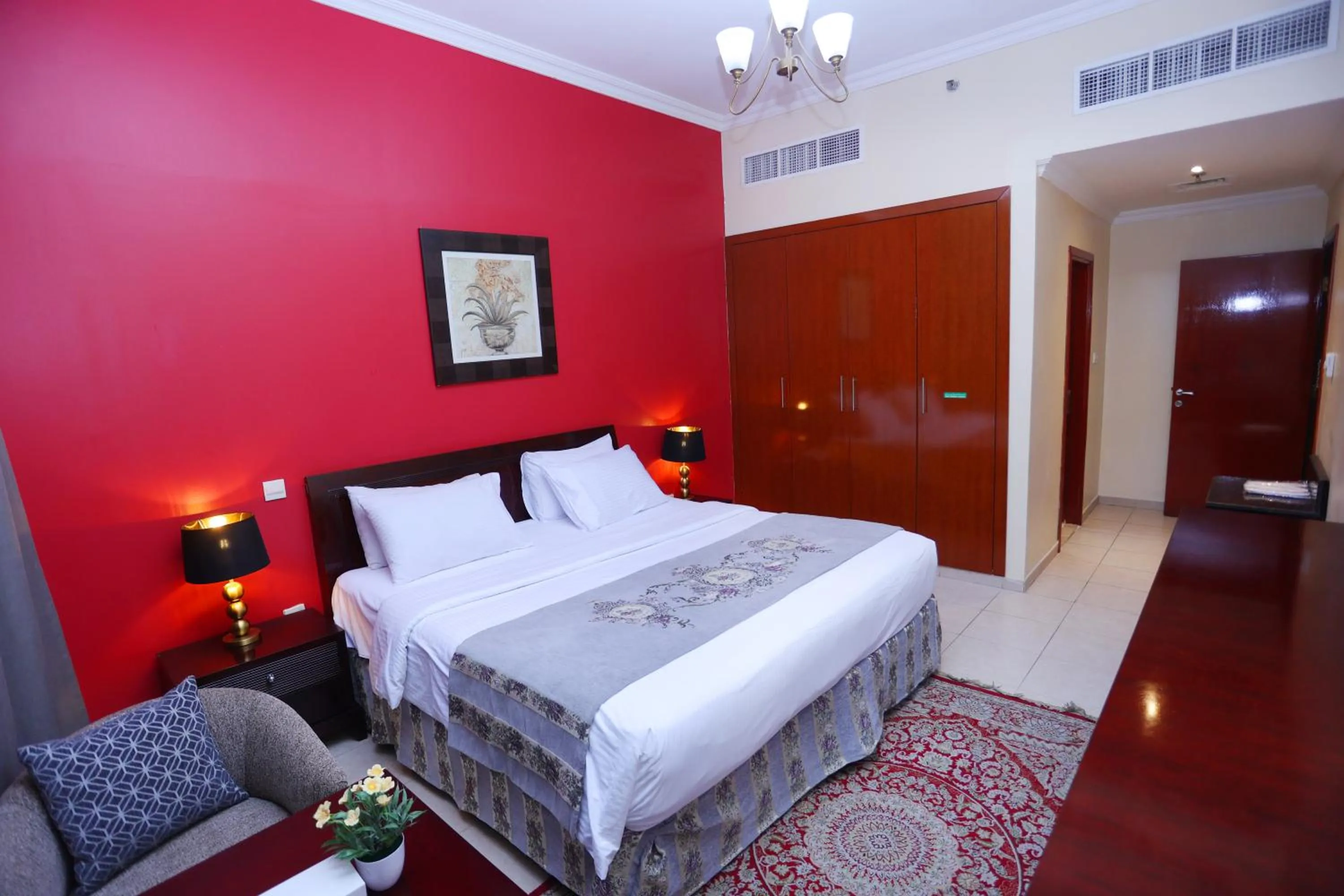 Bed in Icon Hotel Apartments