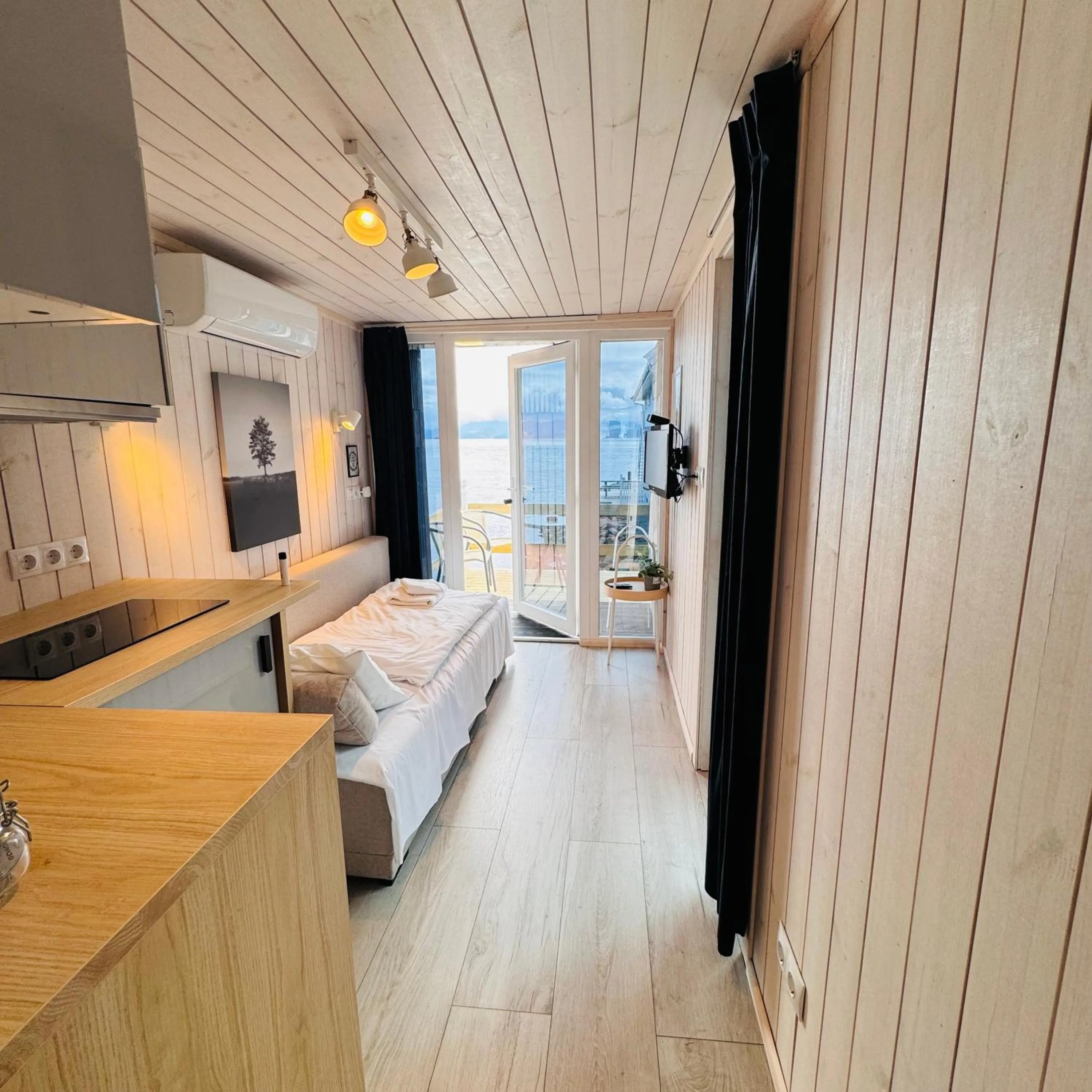 Bed in Sjøberg Hotell og Ferie Leiligheter