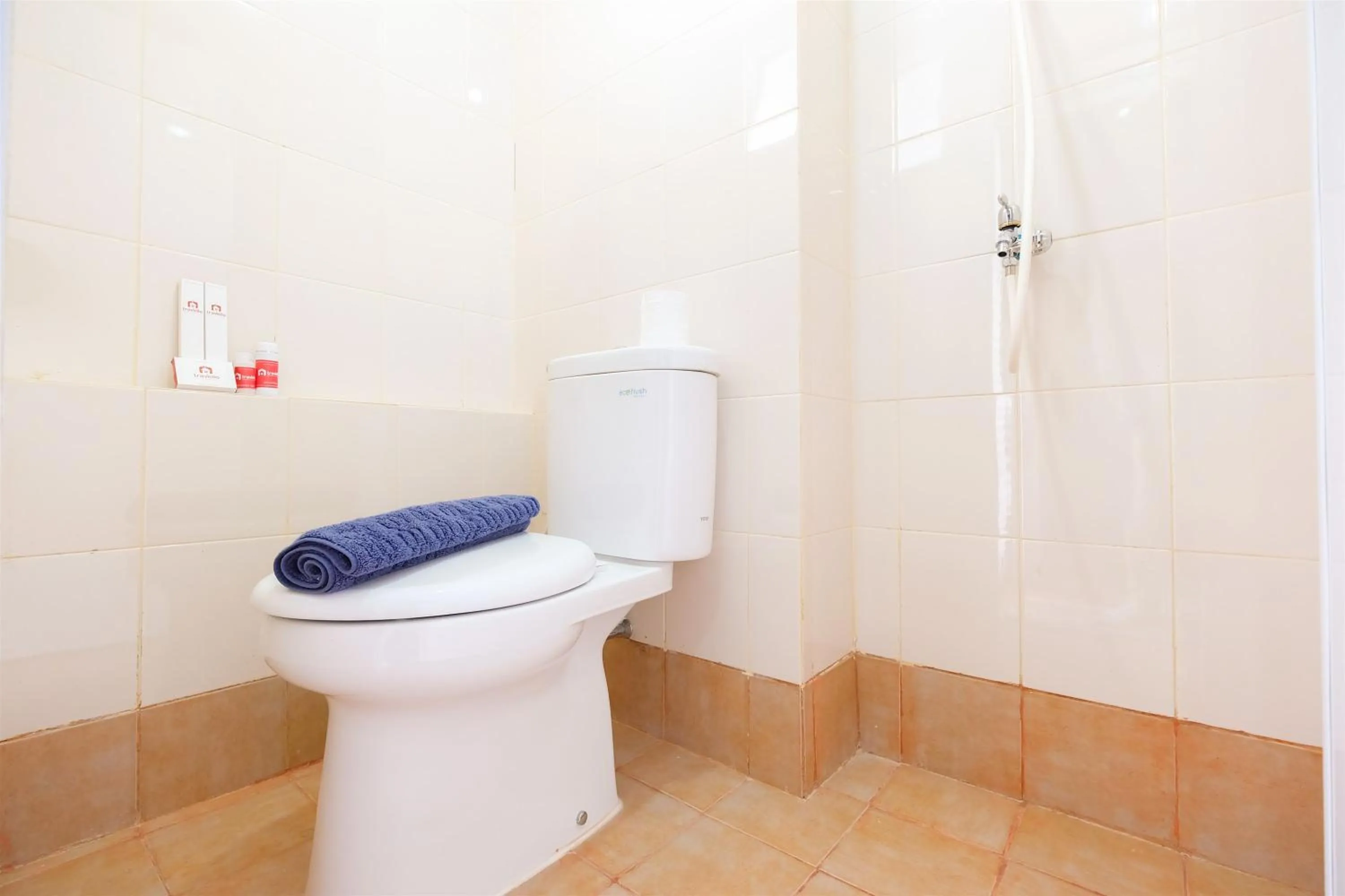 Bathroom in Simple Studio Bassura City Apartment By Travelio