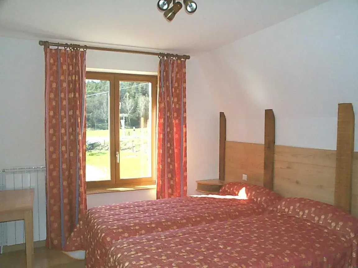 Photo of the whole room, Bed in Hôtel & SPA Rodier Photo of the whole room, Bed in Hôtel & SPA Rodier