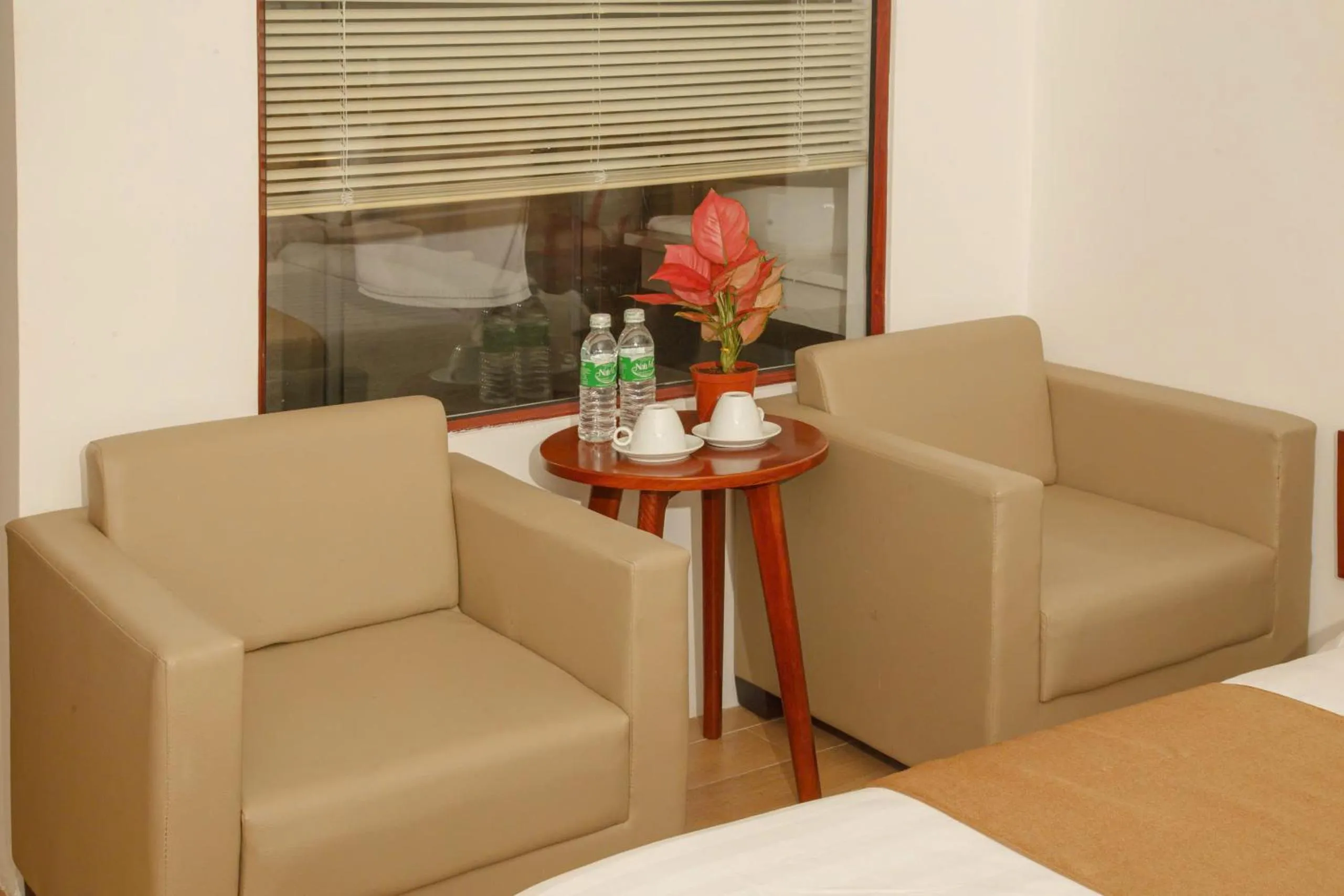 Seating area in Gardenia Hue Hotel