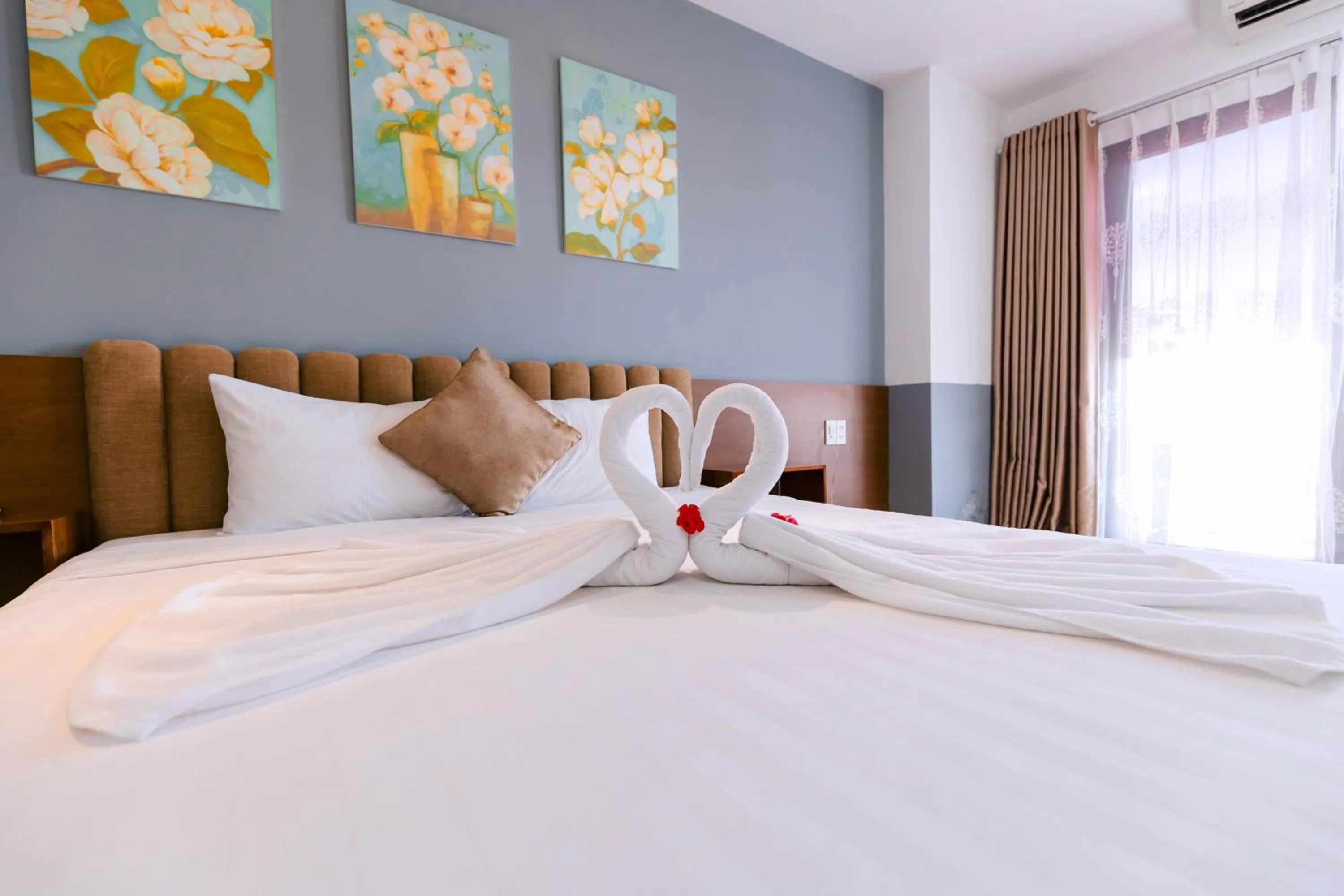 Bed in Gardenia Hue Hotel