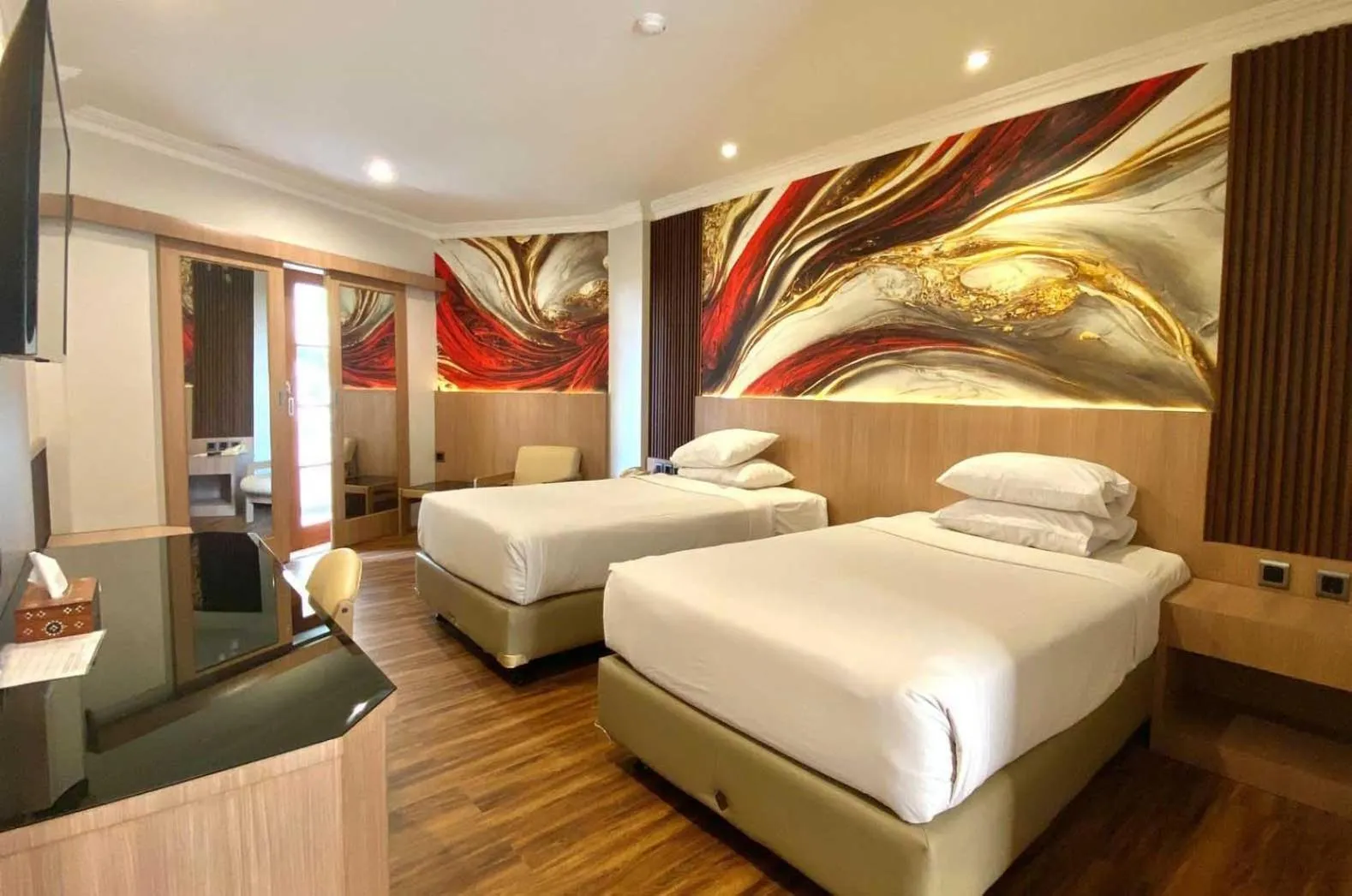 Bedroom, Bed in Lombok Raya Hotel