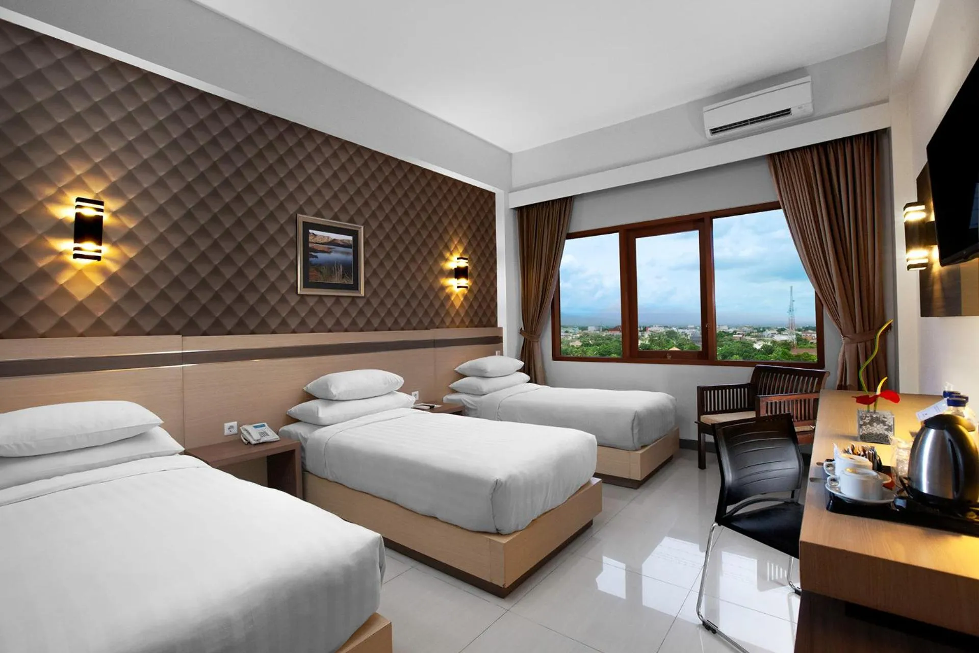 Bedroom, Bed in Lombok Raya Hotel