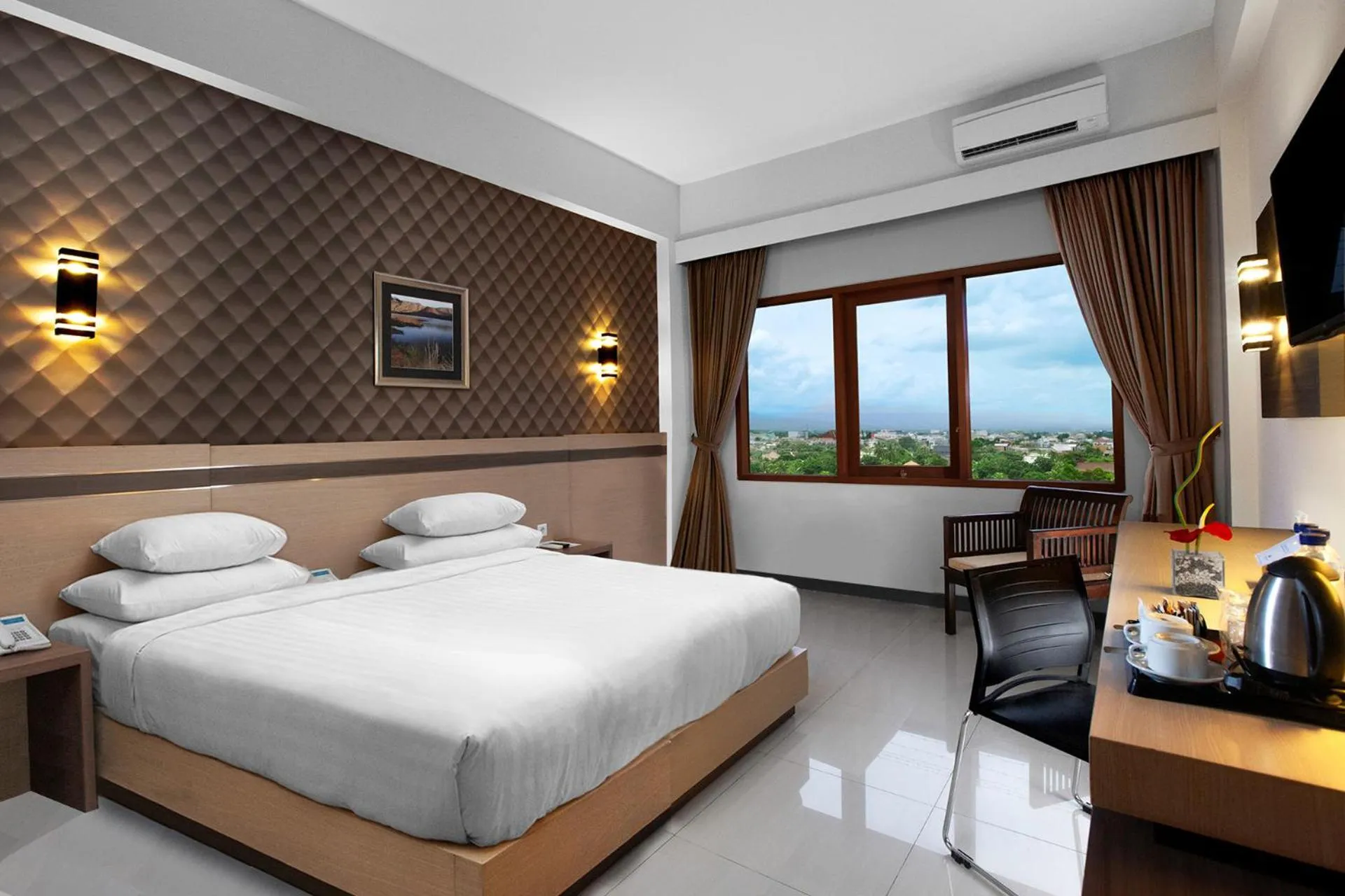 Bed in Lombok Raya Hotel