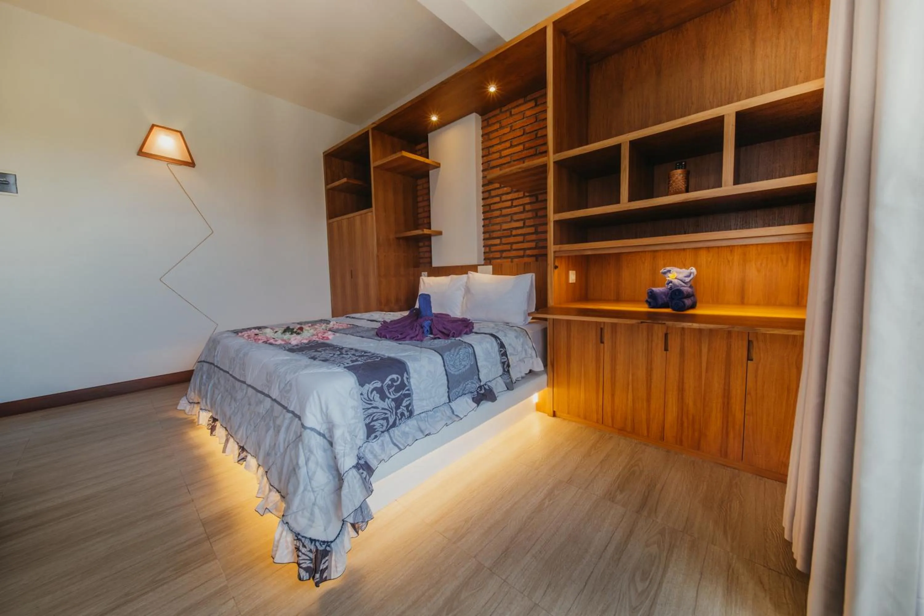 Bed in Kaen Apartments