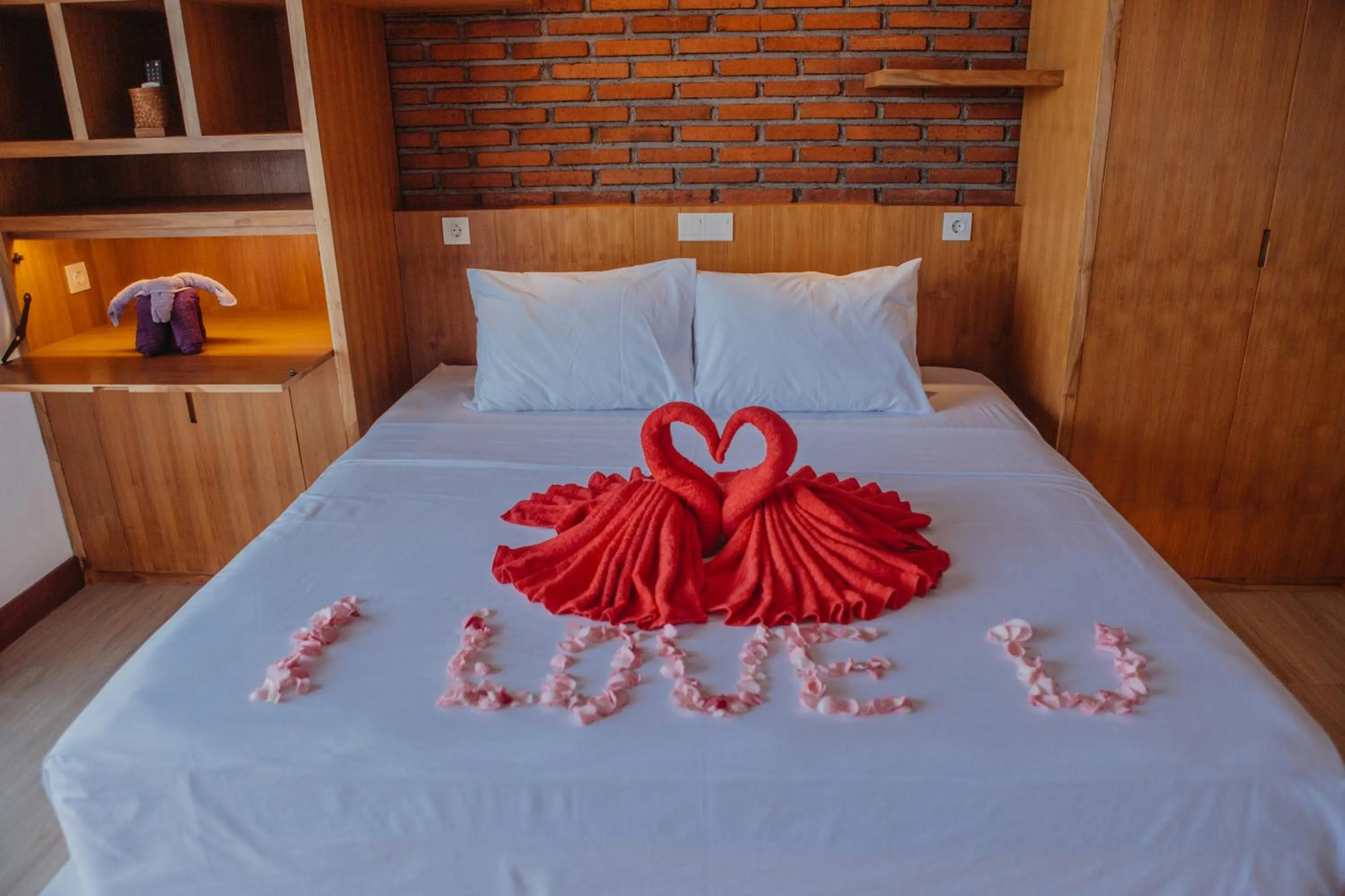 Bed in Kaen Apartments