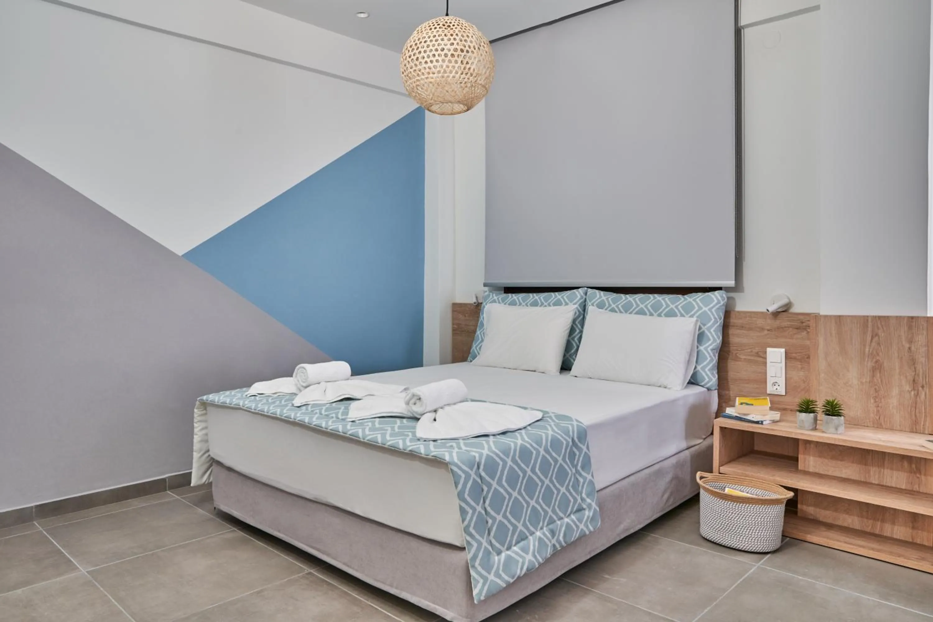 Photo of the whole room, Bed in Mougre studios