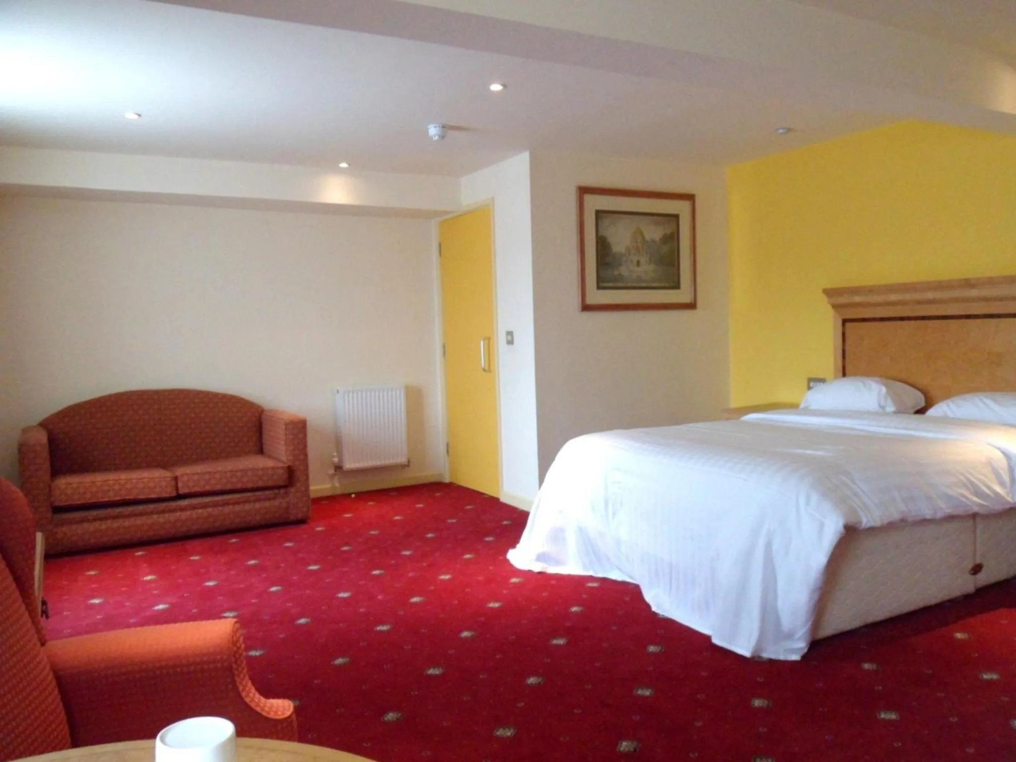 Bed in Three Queens Hotel