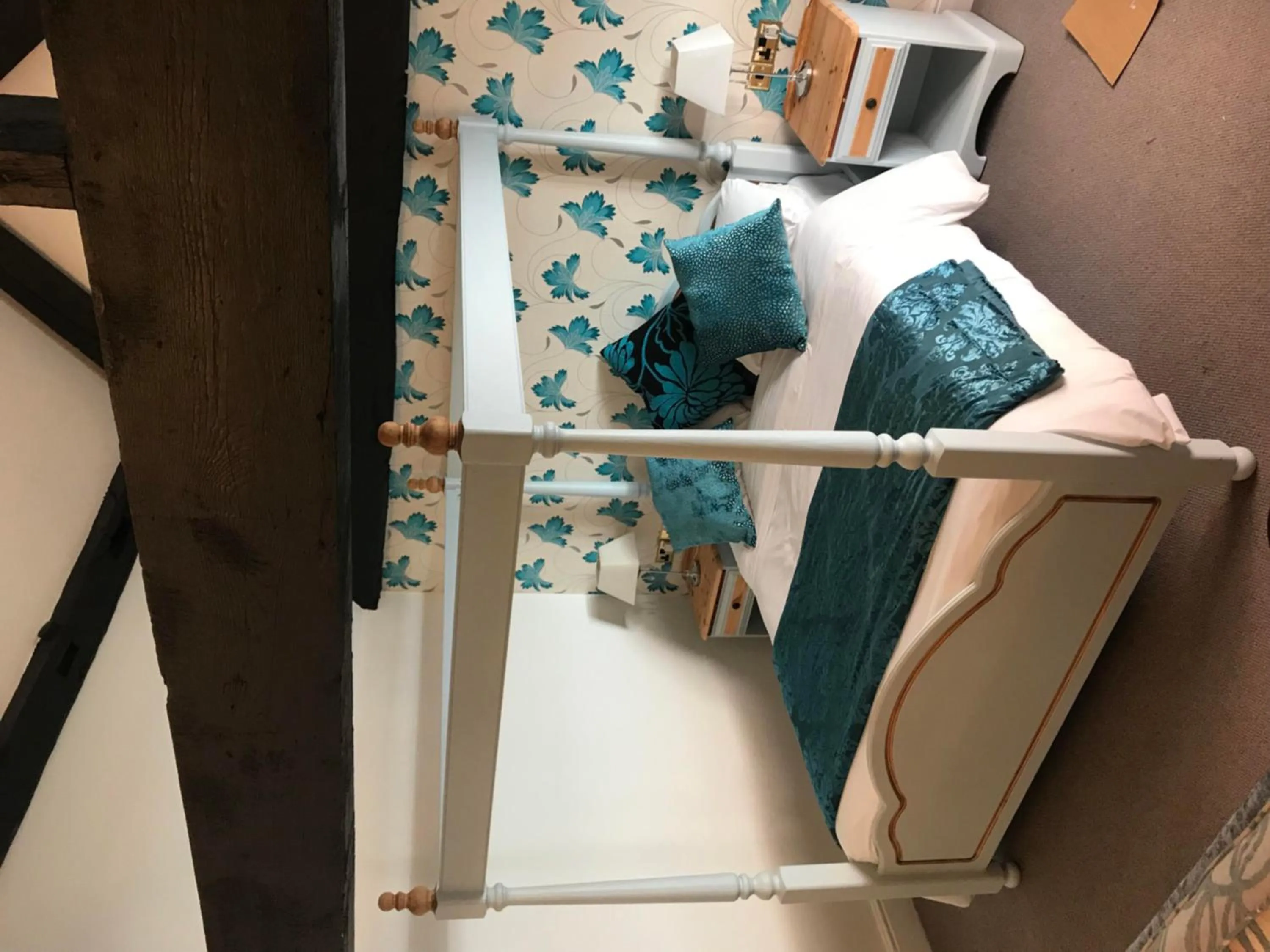 Bed in Three Queens Hotel