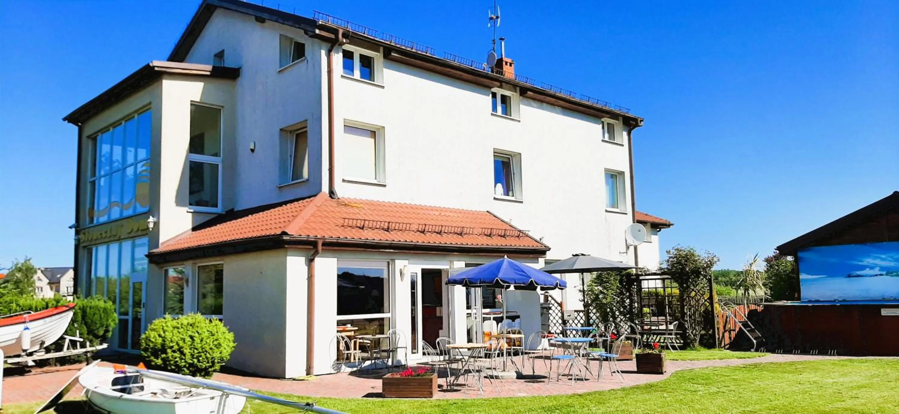 Property building in Słoneczny Dom pokoje i apartament na wynajem